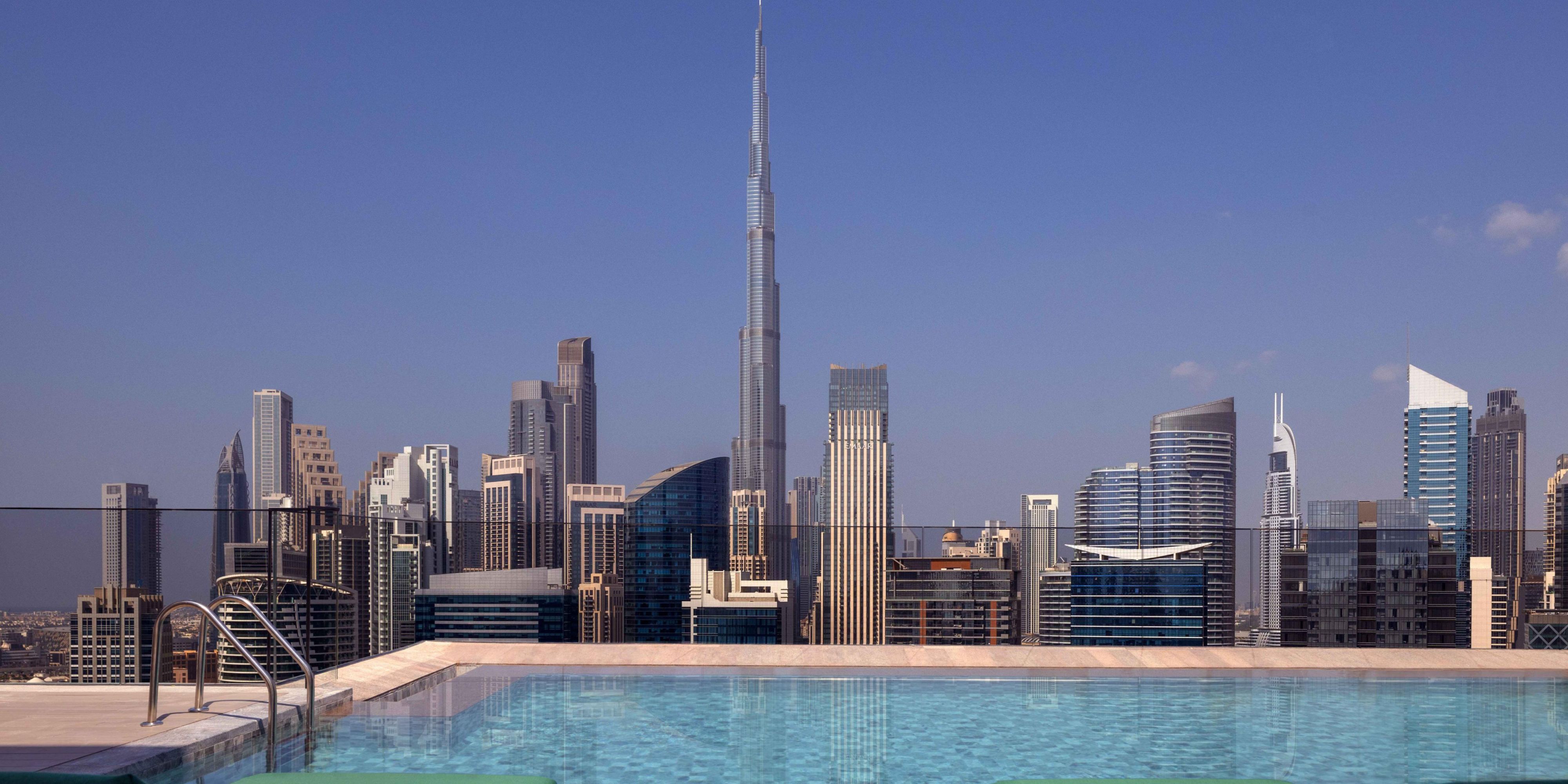 Dive into luxury at this exquisite poolside oasis, boasting stunning vistas of the Dubai Canal and the iconic Burj Khalifa. Indulge in unparalleled relaxation amidst sleek design and unparalleled service. Immerse yourself in the epitome of urban sophistication in Alto.