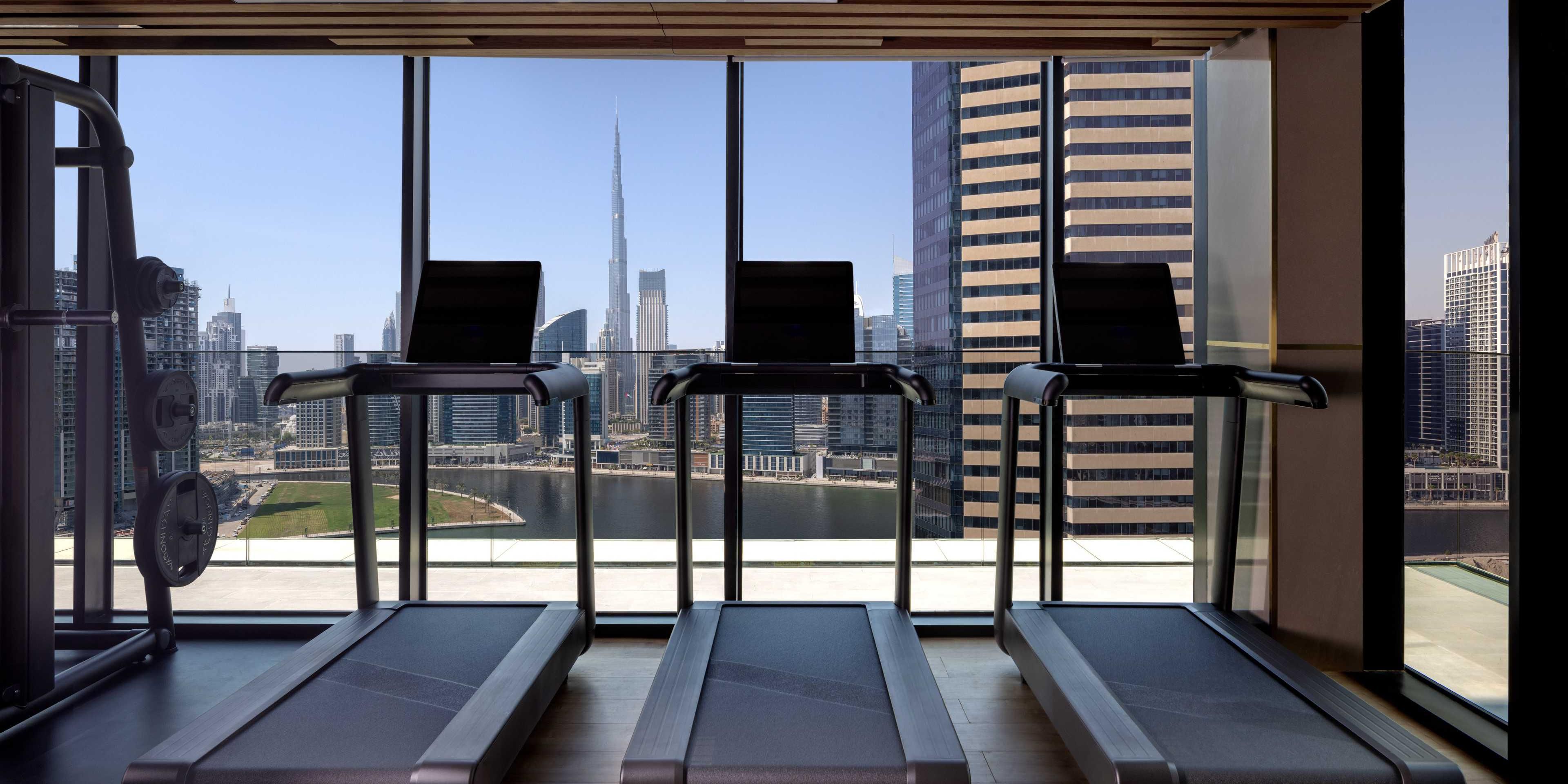 Elevate your fitness regime with panoramic views of the Dubai Canal and the majestic Burj Khalifa at our state of the art centre. Energise your workouts with unparalleled vistas, cutting-edge equipment, and expert guidance, all within an inspiring environment designed to invigorate body and mind.