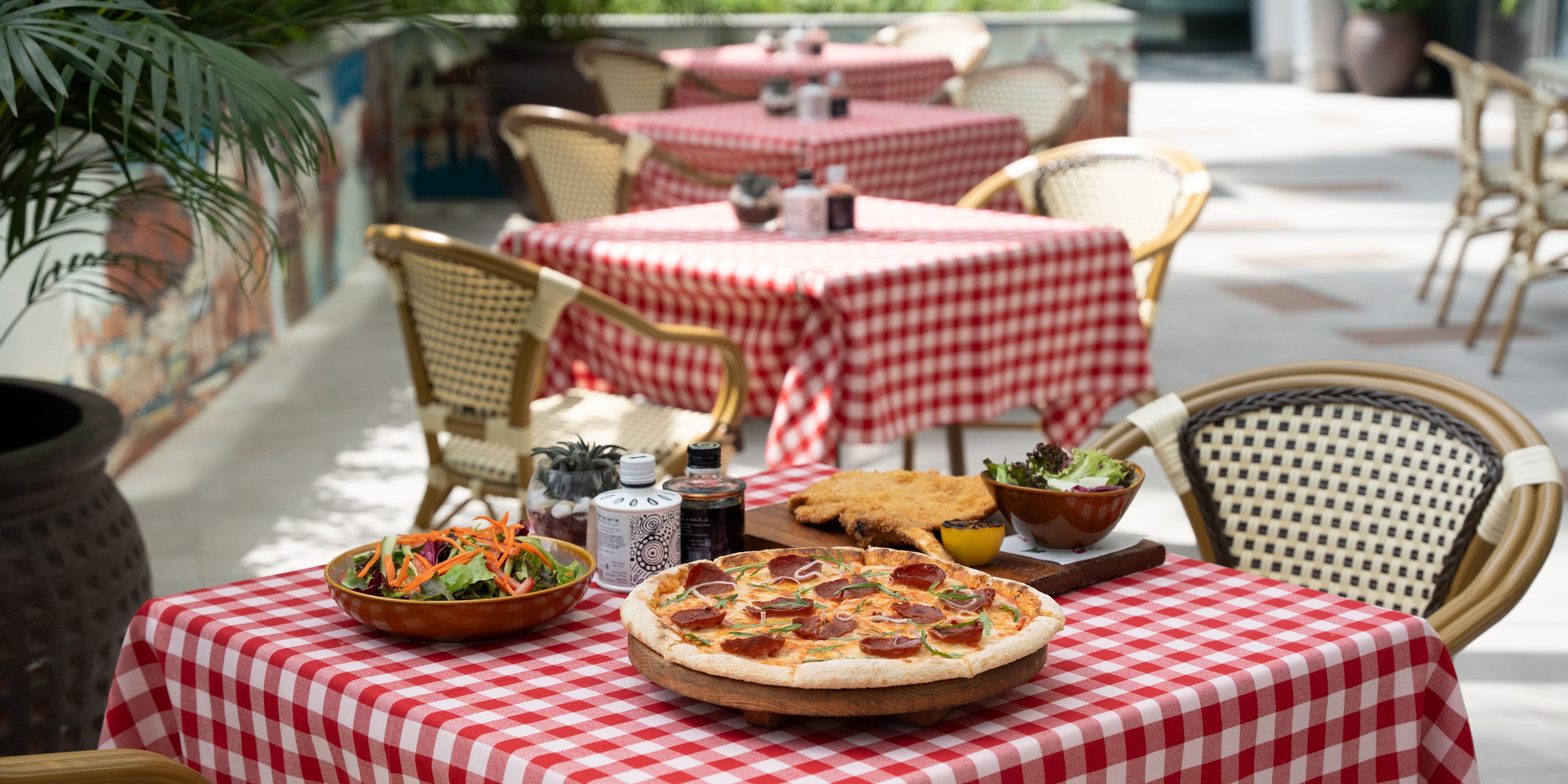 Experience the charm of Italy at MezzaLuna - Trattoria Italiana, where traditional Italian flavours come to life. Our culinary experts craft authentic dishes using fresh seasonal ingredients, ensuring a memorable dining affair. Indulge in the casual yet vibrant ambiance, perfect for any occasion. 