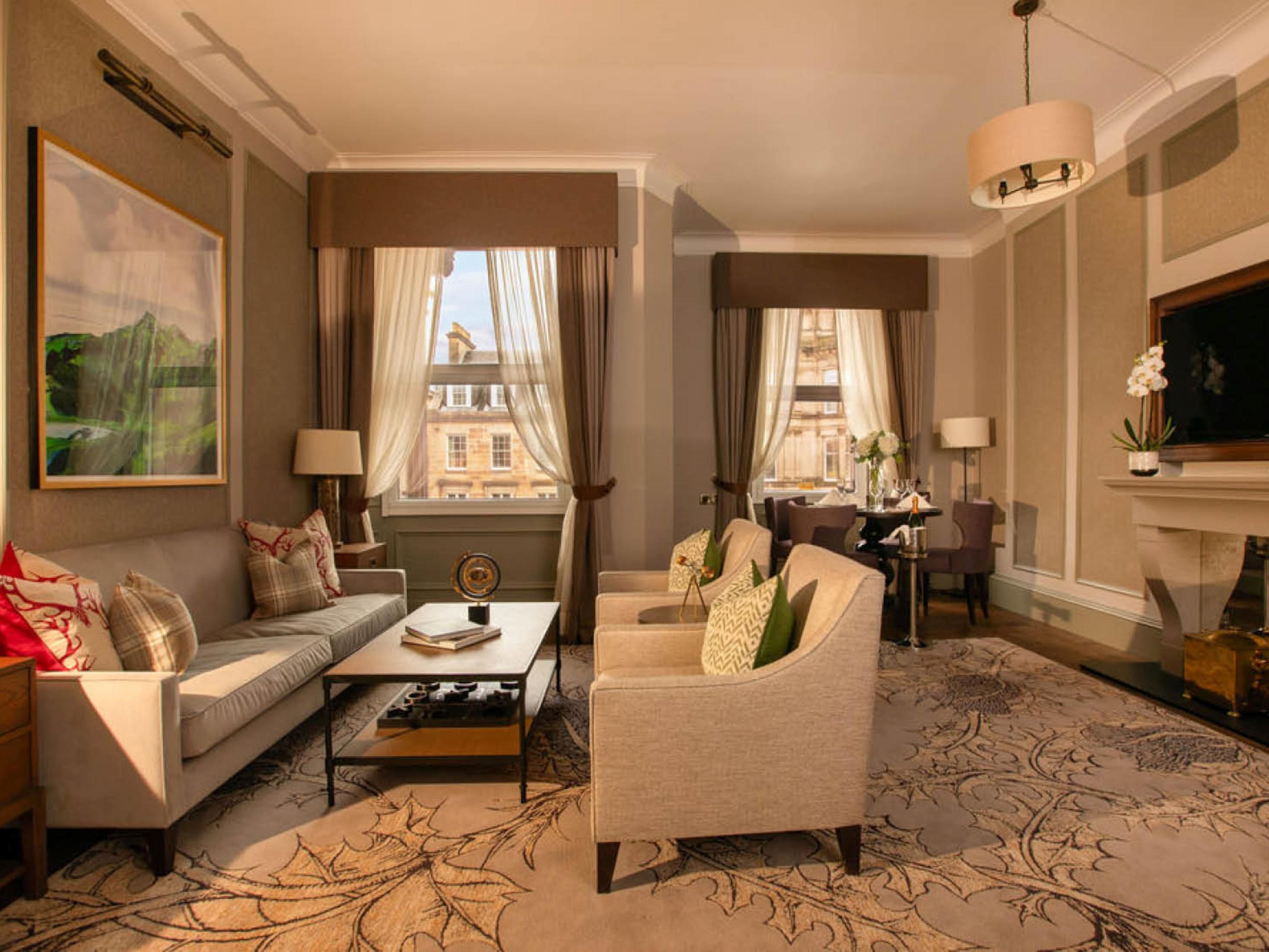Hotel guest room with living space