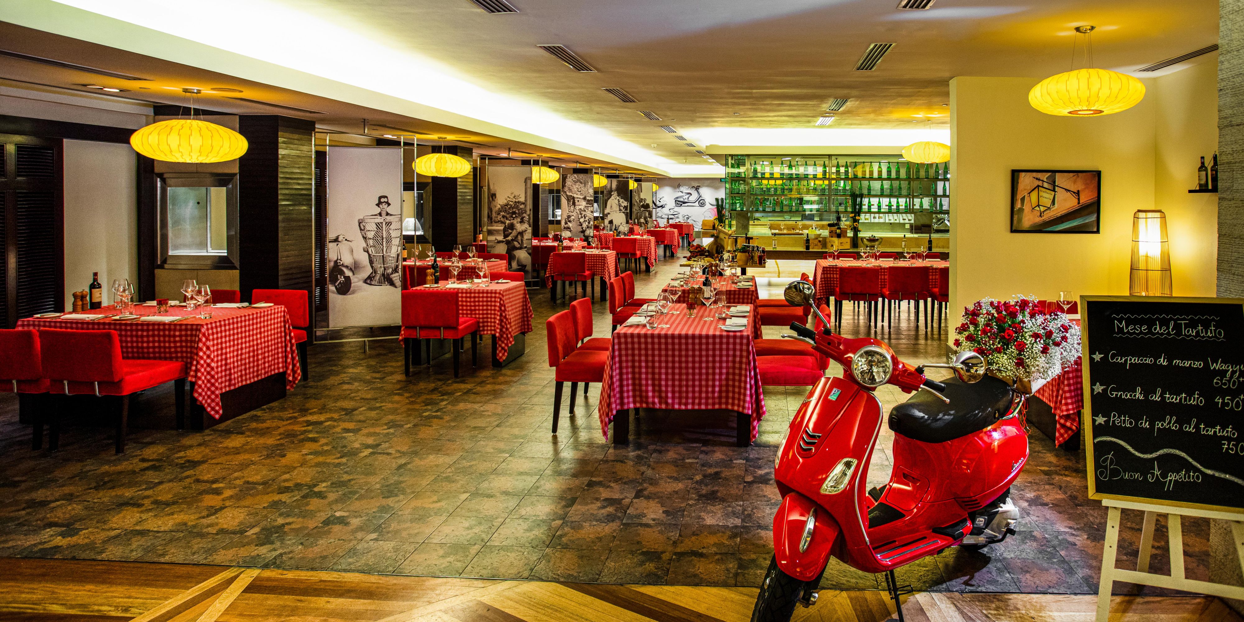 Located on the second floor of the main building, the restaurant blends modern European with rustic Asian design, enhanced with touches of vivid color. Revel in the magic of watching authentic Italian cuisine prepared in our open kitchen or choose one of our private dining rooms for a more intimate experience.