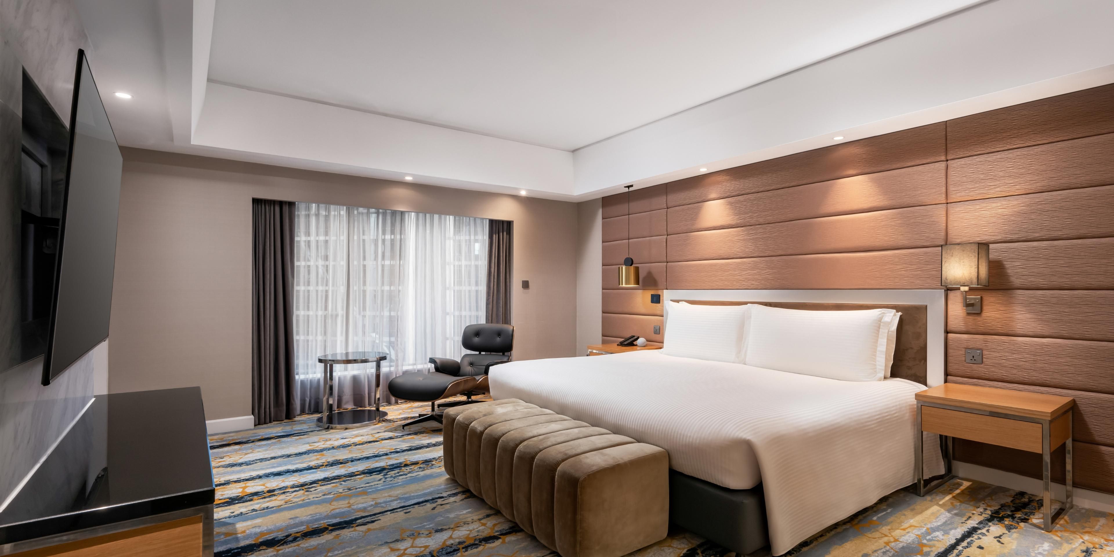Nestled amidst the vibrant cityscape, our luxurious rooms and suites provide an exceptional home away from home. Featuring 473 spacious rooms, our diverse room categories ensure ultimate comfort and convenience, boasting super king beds, a Club lounge and amenities suitable for business travellers, solo adventurers, couples, and families alike.