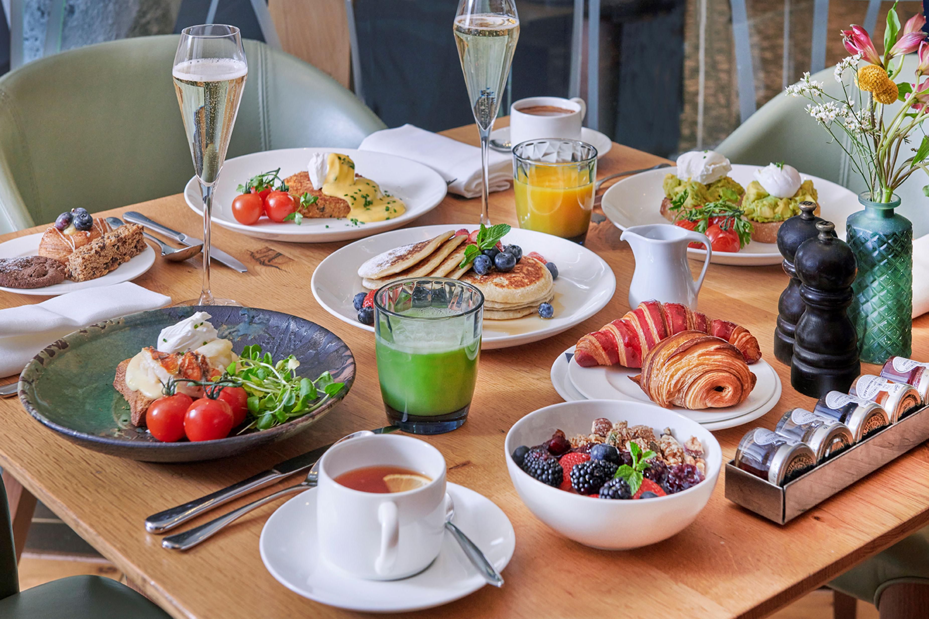 Various breakfast options on a dining table 