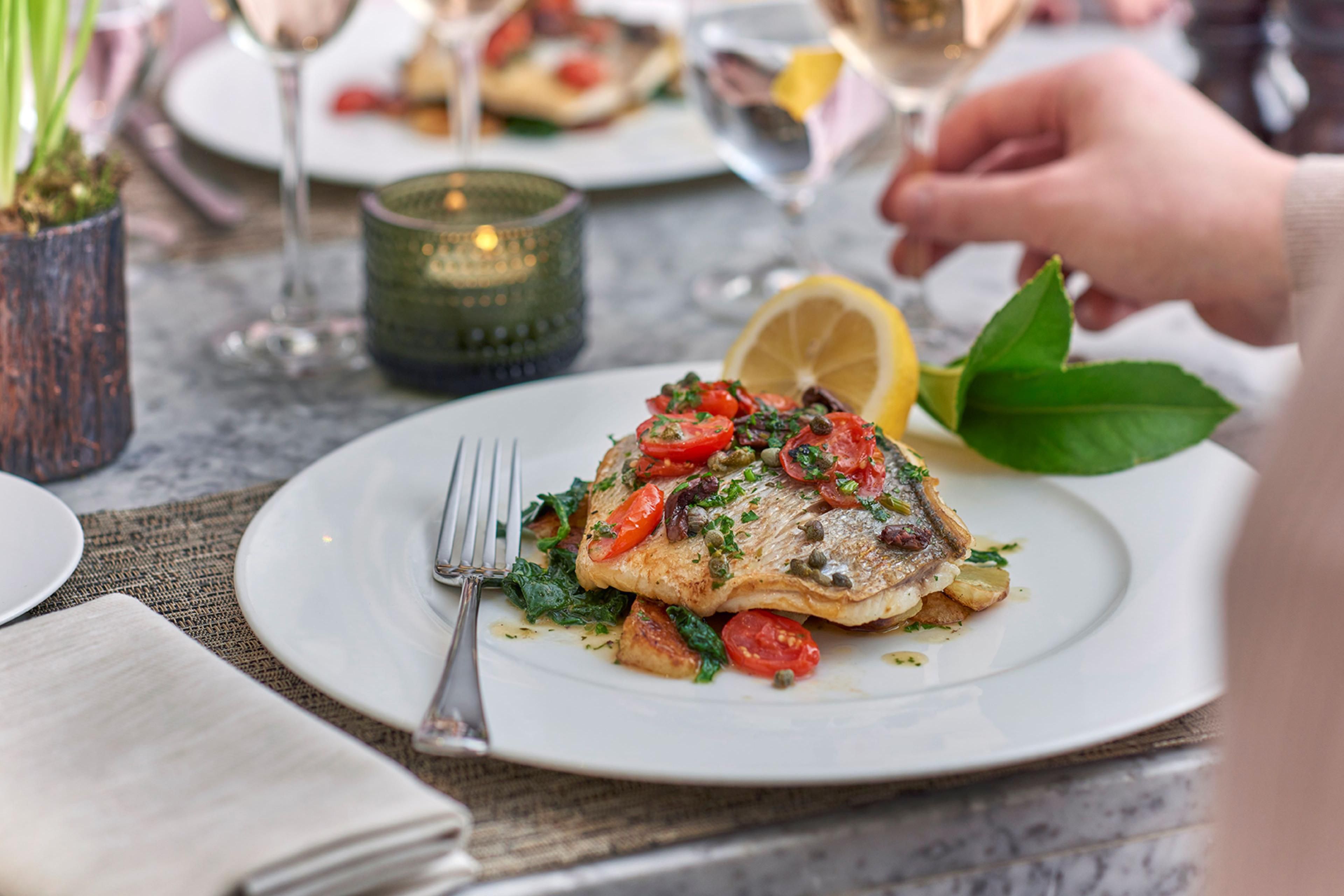 Sea bass on a dinner plate