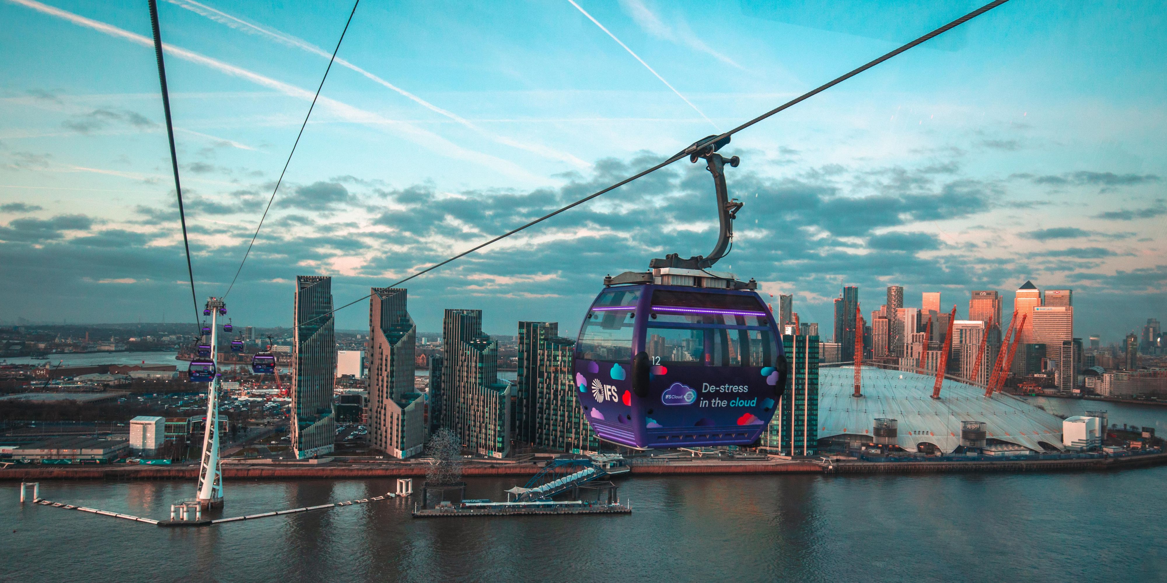 Stunning cable car ride above The Thames with city views.