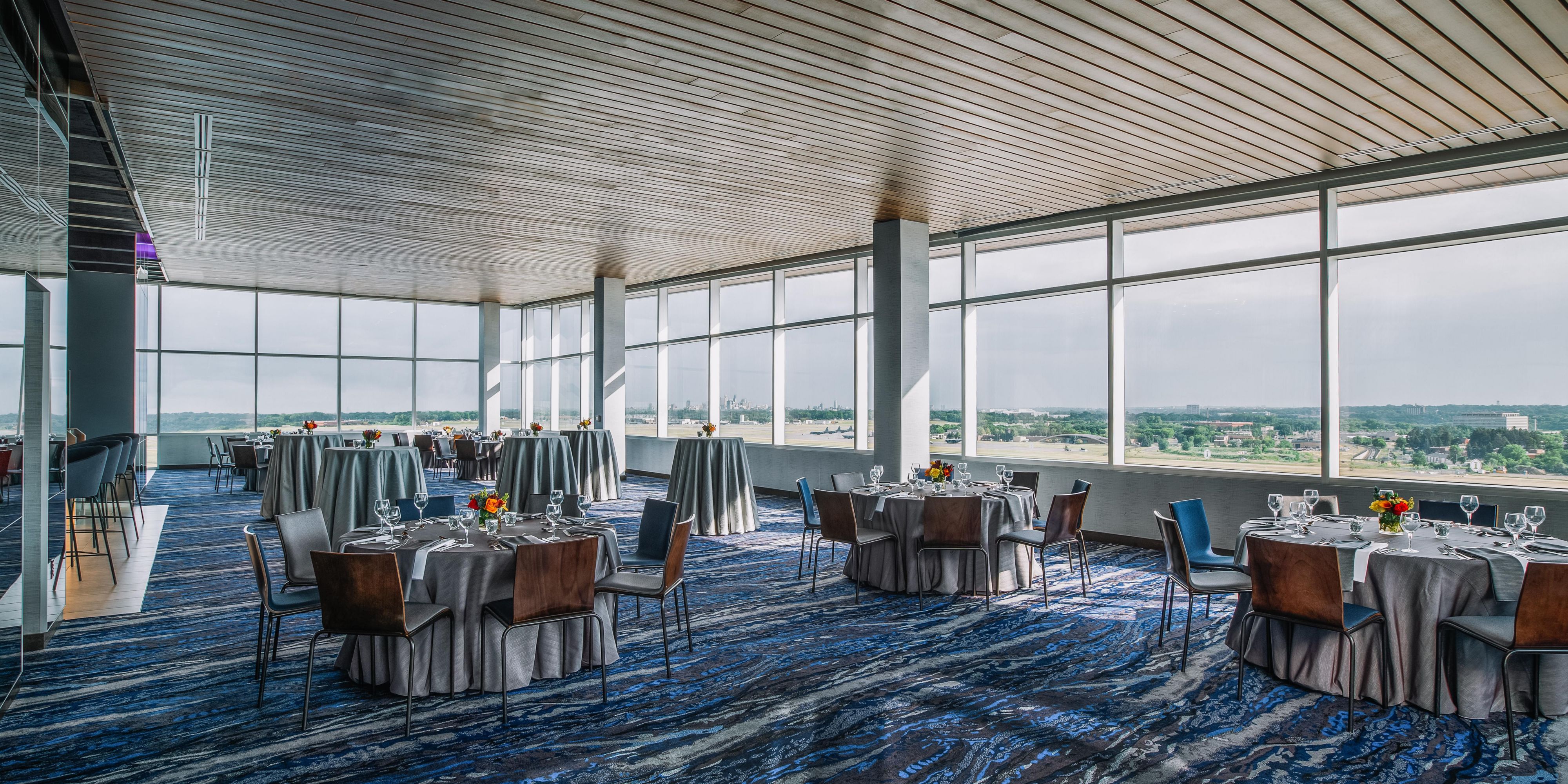 The penthouse-level Attitude offers a 180-degree panorama view of the Minnesota River Valley bookend by dramatic sights of both Minneapolis and St. Paul skylines. Passport Ballroom is the perfect backdrop to make life-long memories with vast ceiling heights and crystal teardrop chandeliers with modern design.