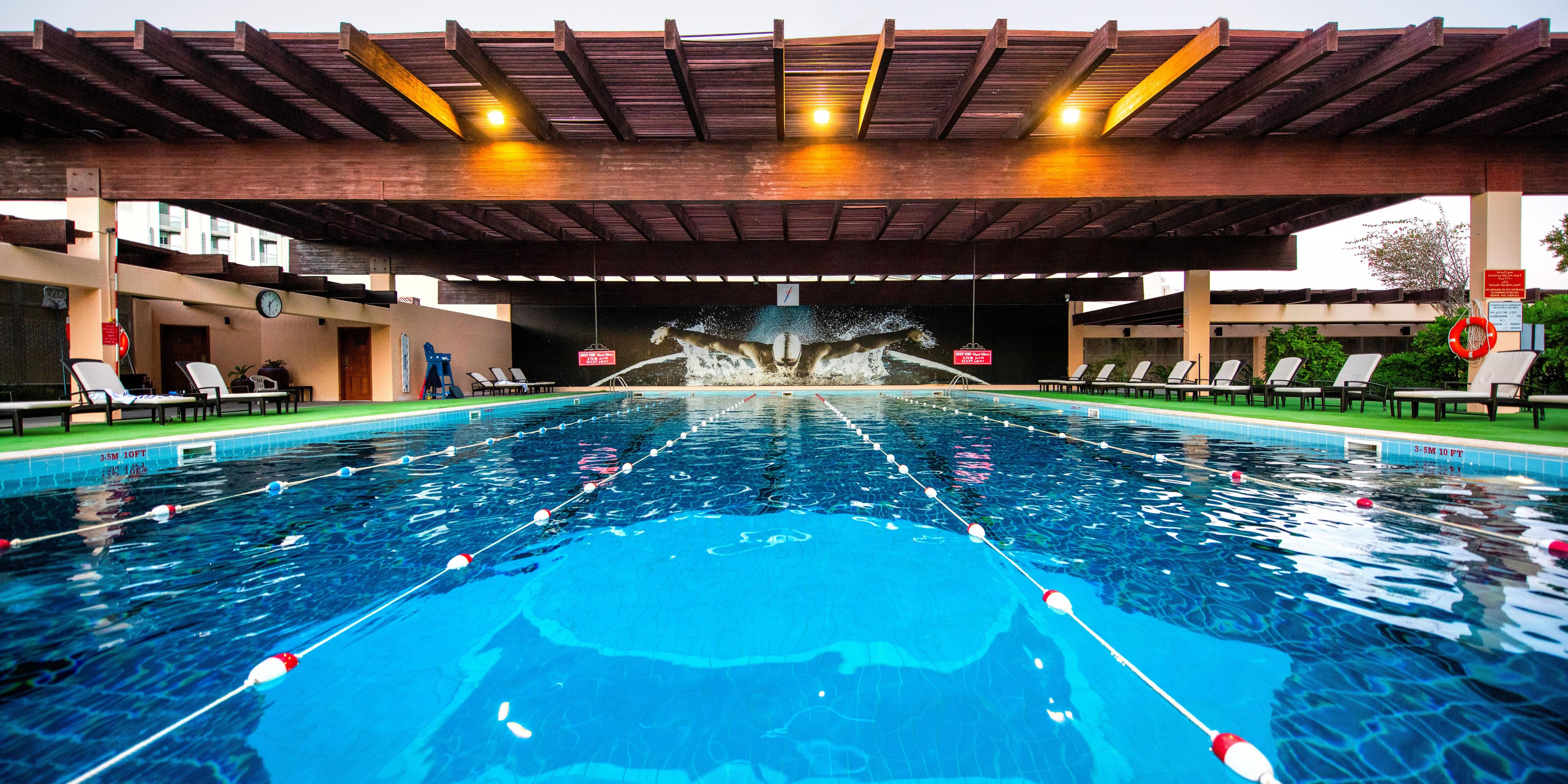 Experience complete wellness and elevate your fitness journey at Muscat’s premier lifestyle destination, Palm Beach Club. Dive into the Olympic-sized pool, unwind in the sauna, or enjoy a friendly match on the floodlit tennis and padel courts. Relax by the lagoon-style pools or stroll along the sandy shore with beachside access.