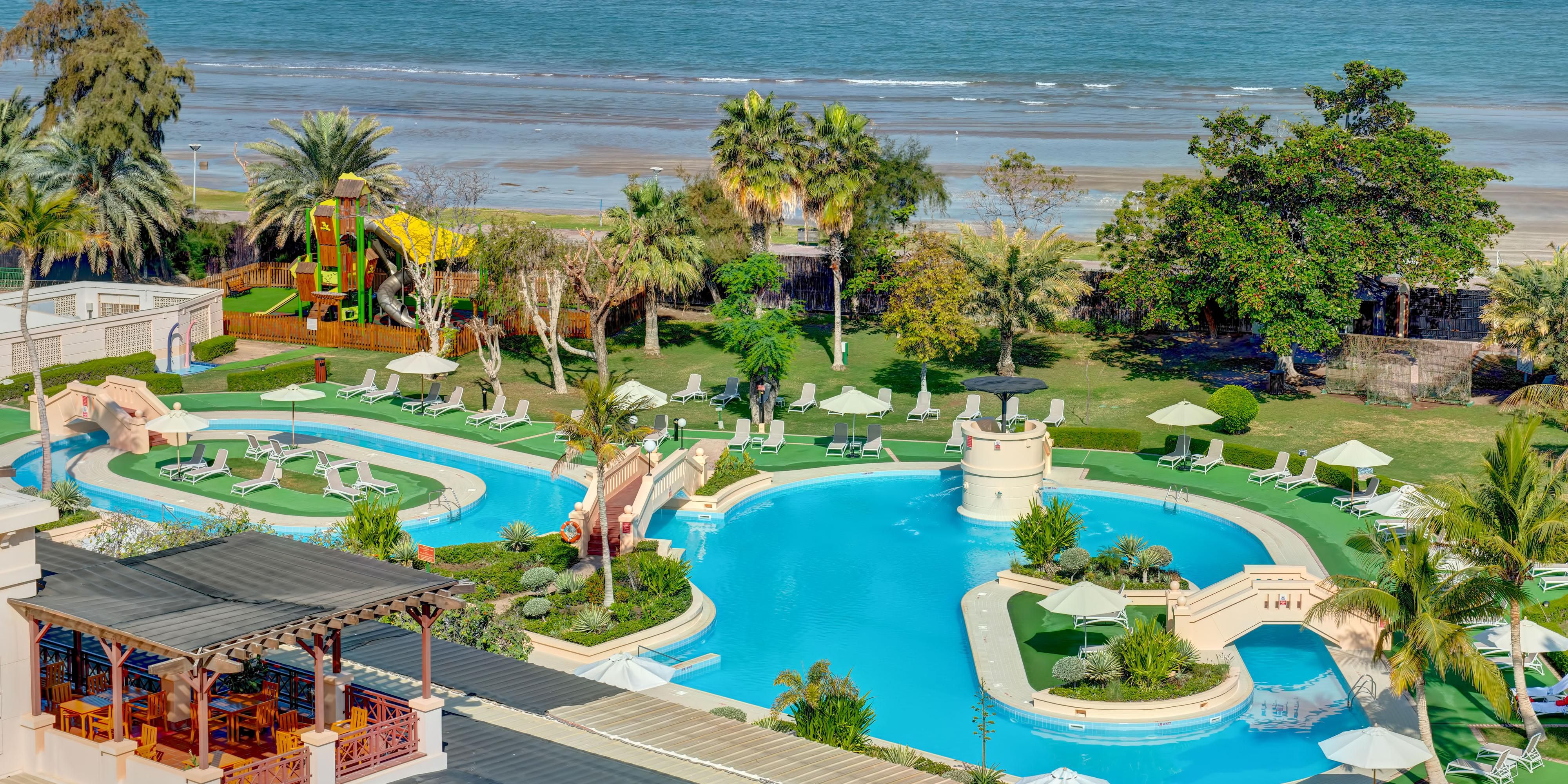 Escape to Palm Beach Club for a complete wellness experience and elevate your fitness routine at Muscat’s ultimate lifestyle destination. Dive into the Olympic-sized pool, unwind in the sauna, or enjoy a friendly match on the floodlit tennis and padel courts. Relax by the lagoon-style pools or stroll along the sandy shore with beachside access.