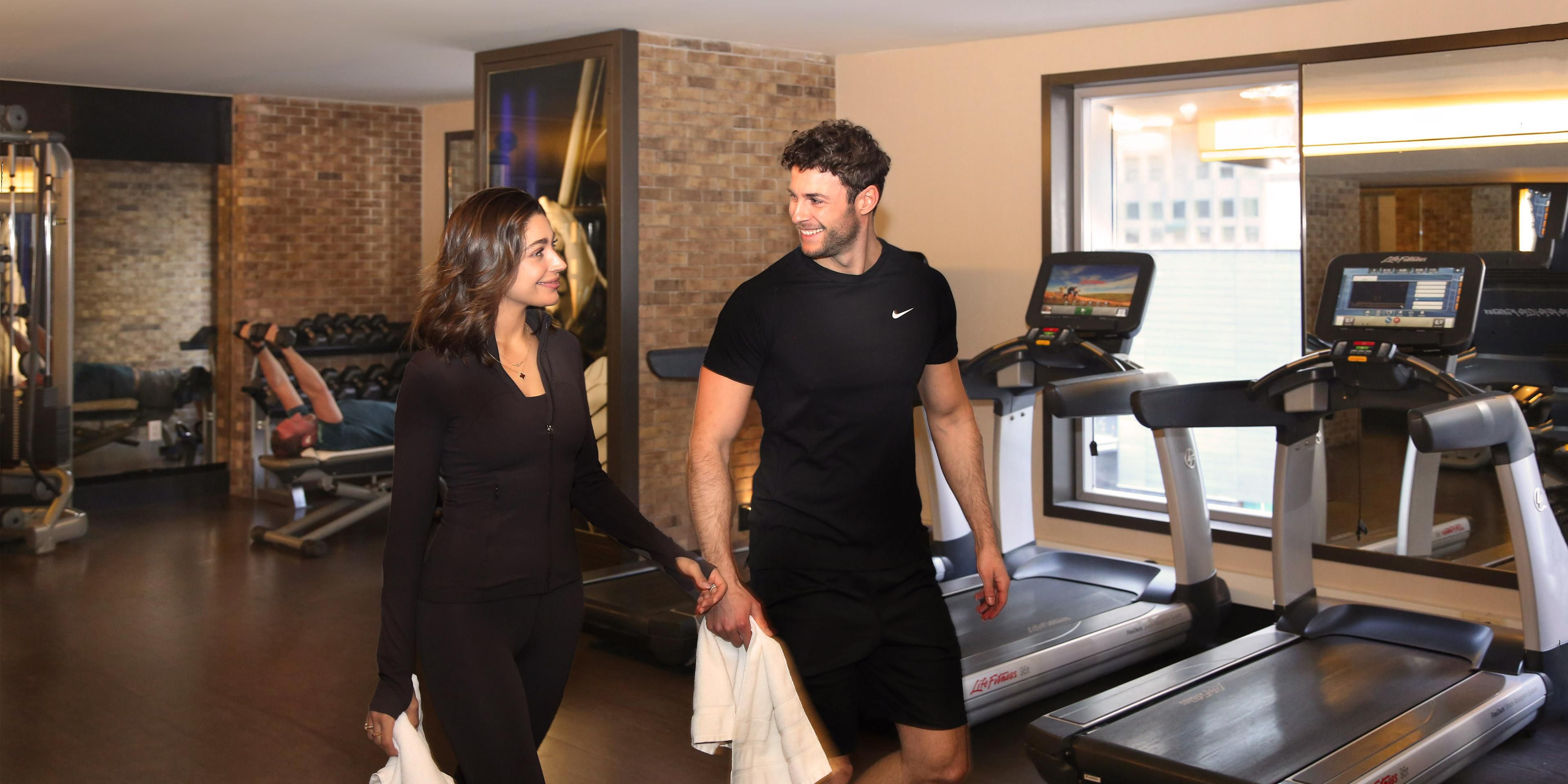 Couple walking in the Hotel Fitness Center