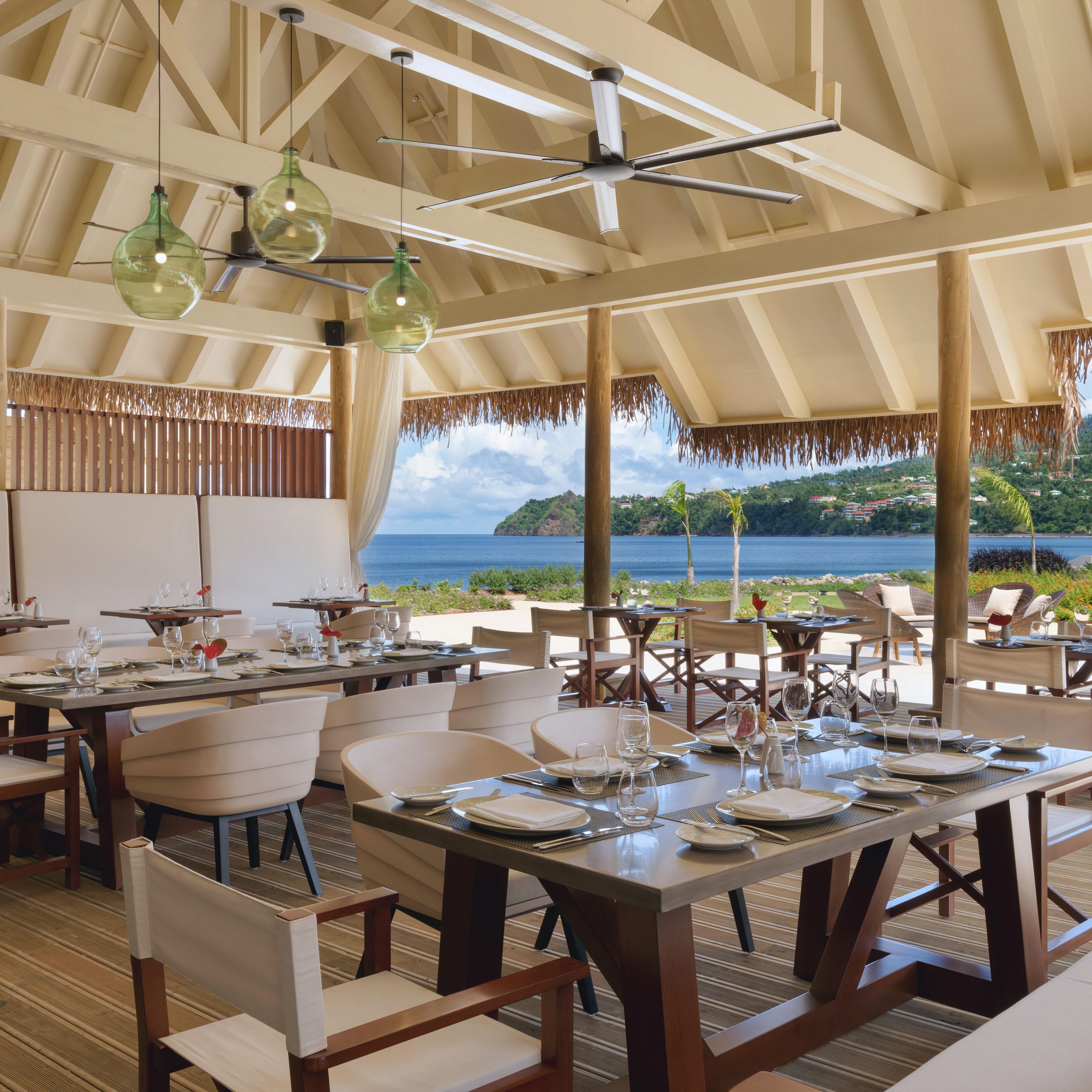Relax in ocean breezes while you dine at Kwéyòl Beach Café.