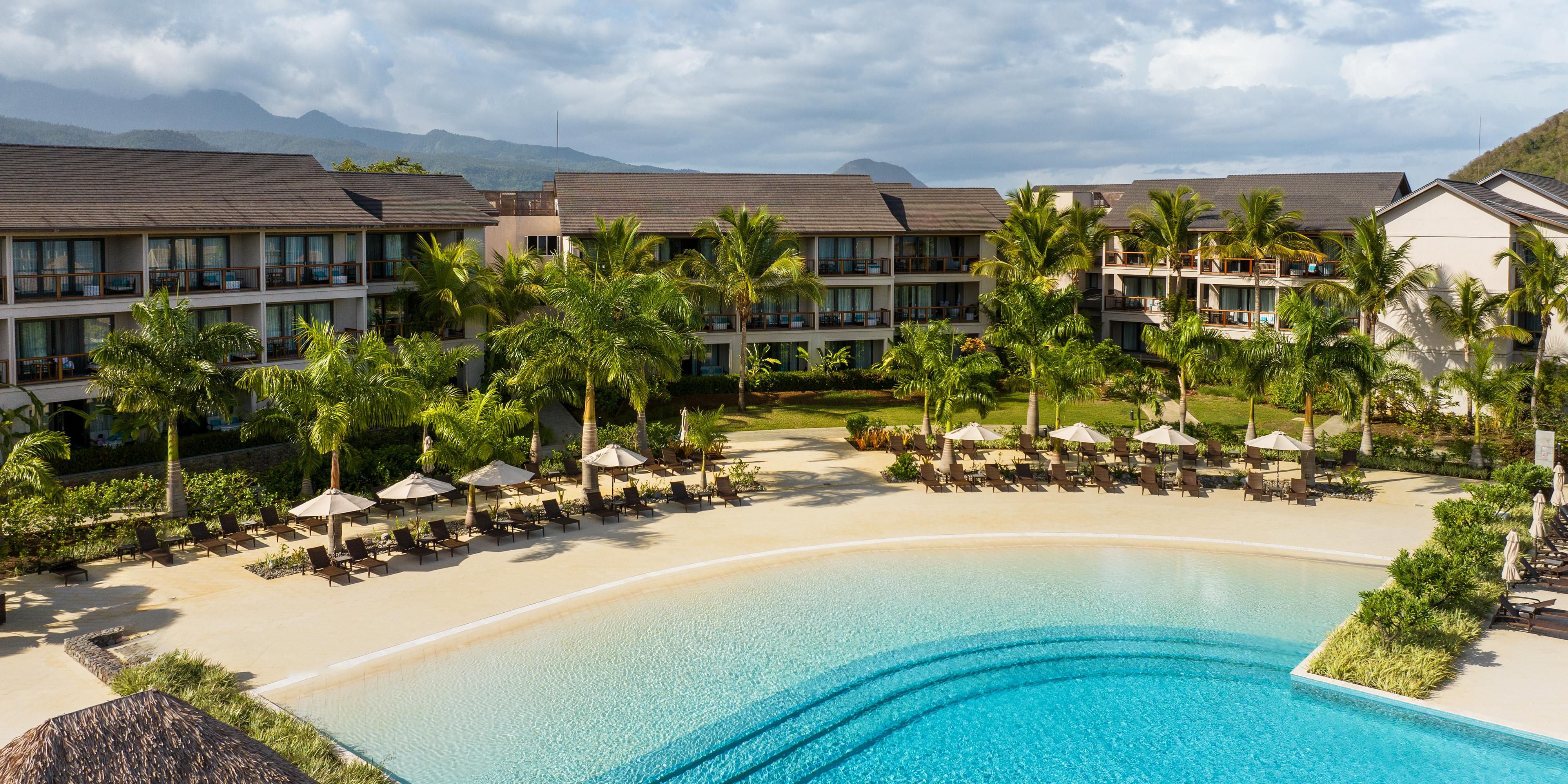 Relax in our crystal-clear pools, where the lush tropical scenery and the Caribbean breeze create an oasis of pure serenity.