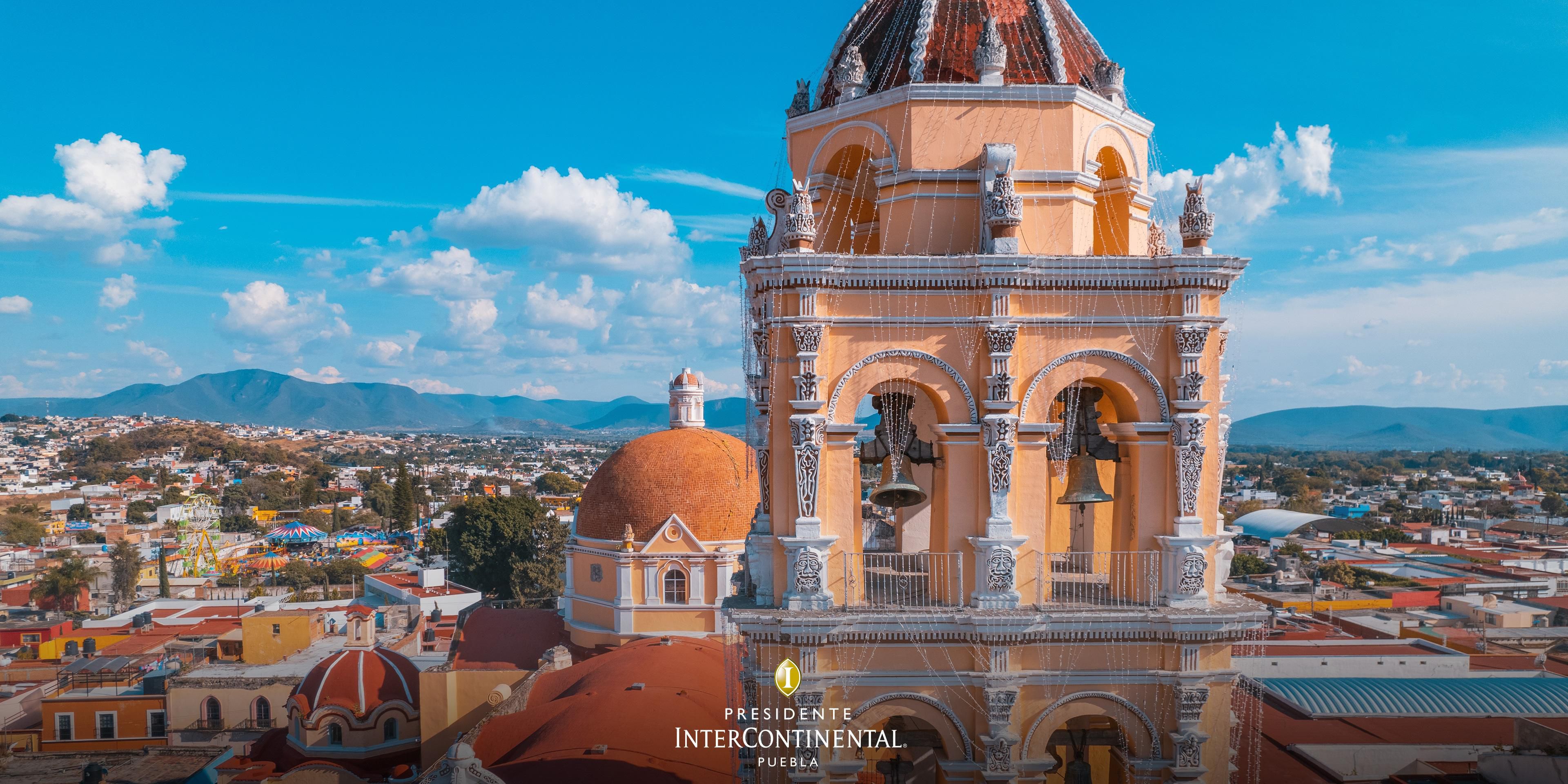 Visiting Puebla lets you explore the Sanctuary of Our Lady of Remedies in Cholula, stunning tiled churches, and the vibrant colors, gardens, and flavors of Atlixco—some of the most charming colonial towns in Mexico. Call +52-55-94356188, mention code IXUXY, and enjoy up to 20% off, breakfast for 2 adults & 2 children, and a Premium room upgrade.