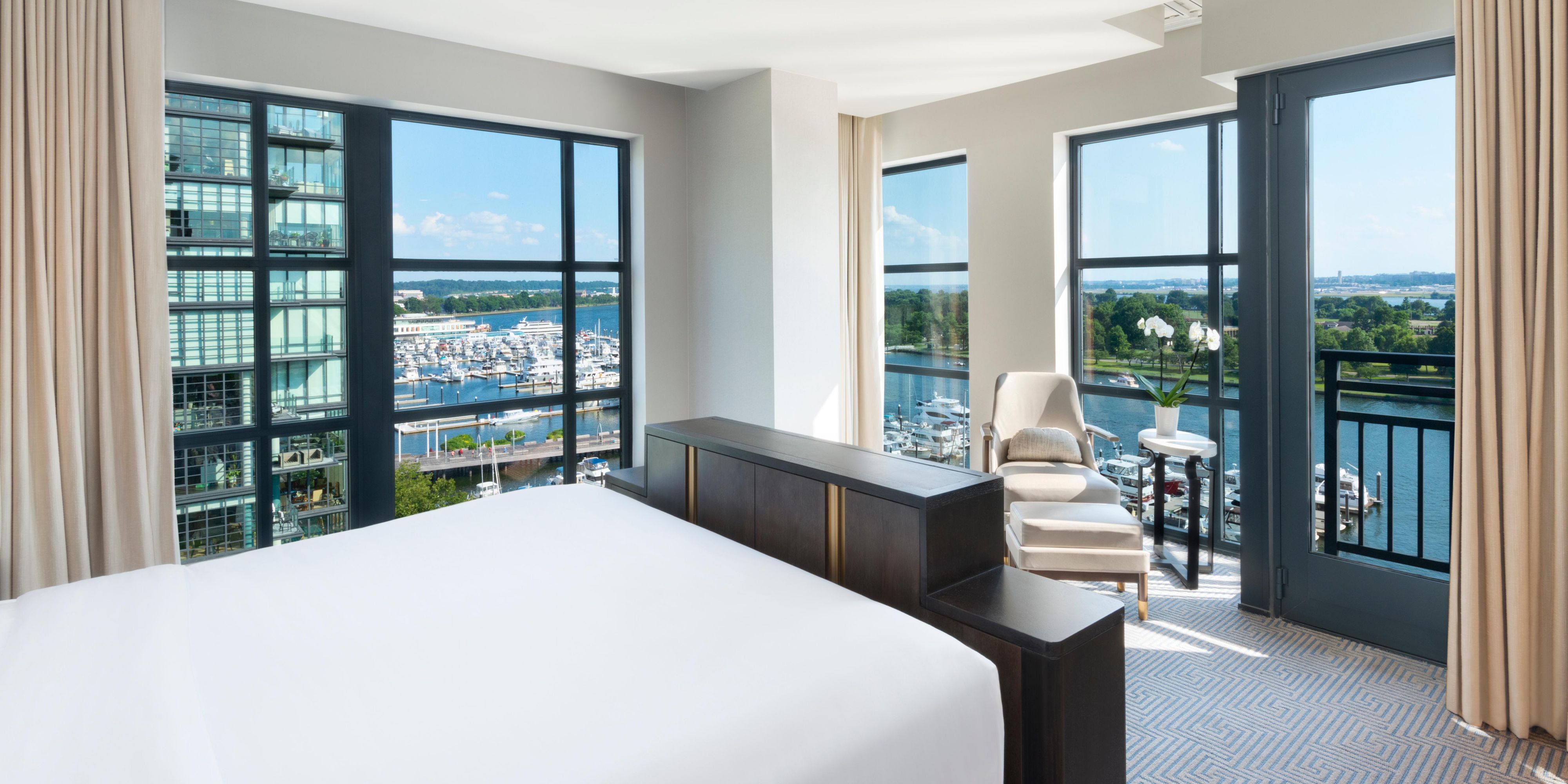 Compass Suite Bedroom with waterfront view 