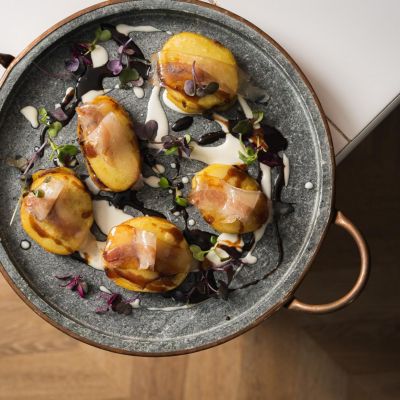 Olot-style potatoes with cured Iberian pancetta and Tou cheese 