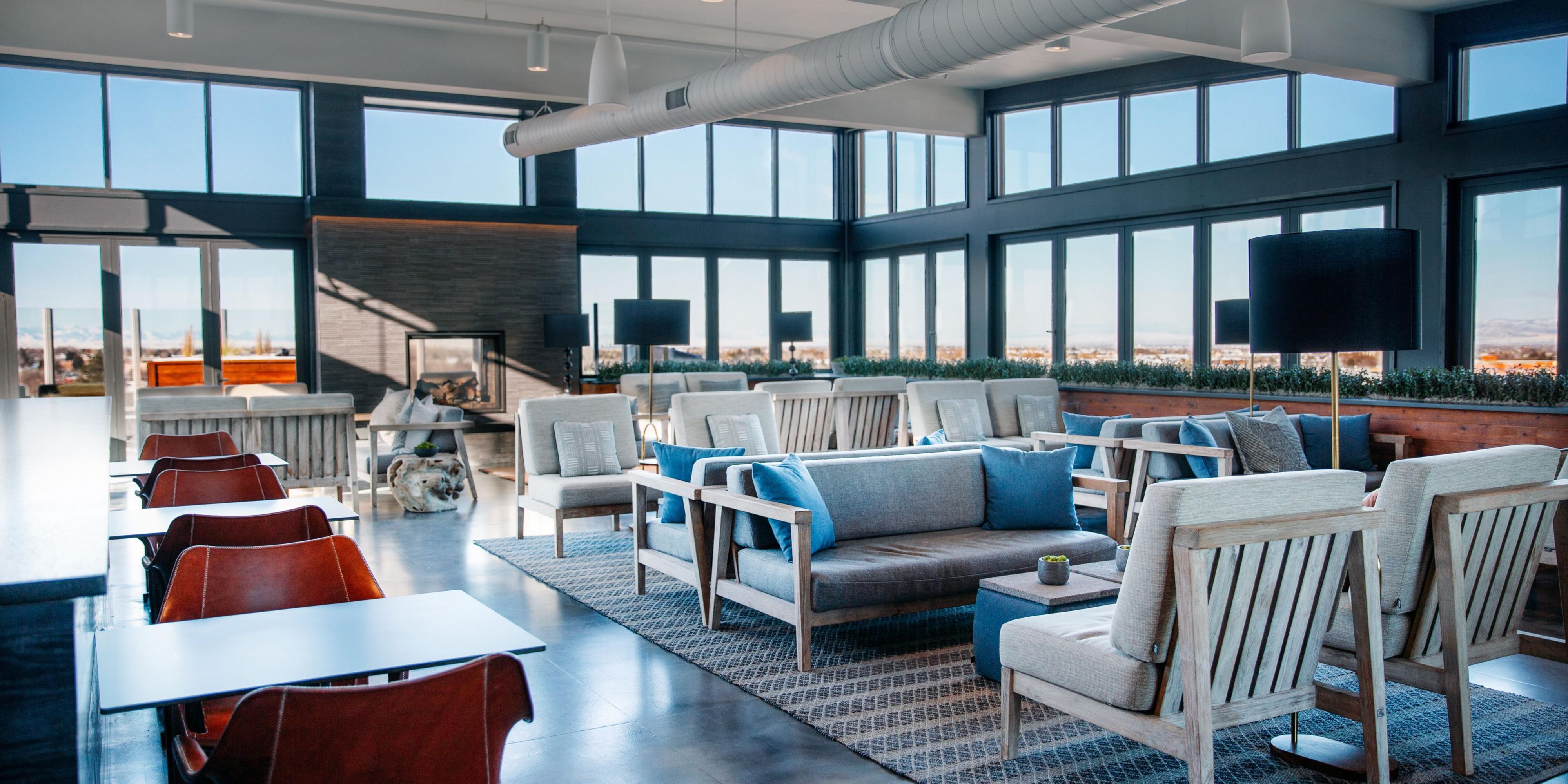 No matter the season, head up to the roof of Kimpton Armory hotel and kick back with a drink in hand in our custom Sky Shed. Light, airy and modern, this glass-enclosed gathering place is perfect for unwinding with a cocktail while you enjoy views of not one but four (yes, four) mountain ranges visible from Downtown Bozeman.
