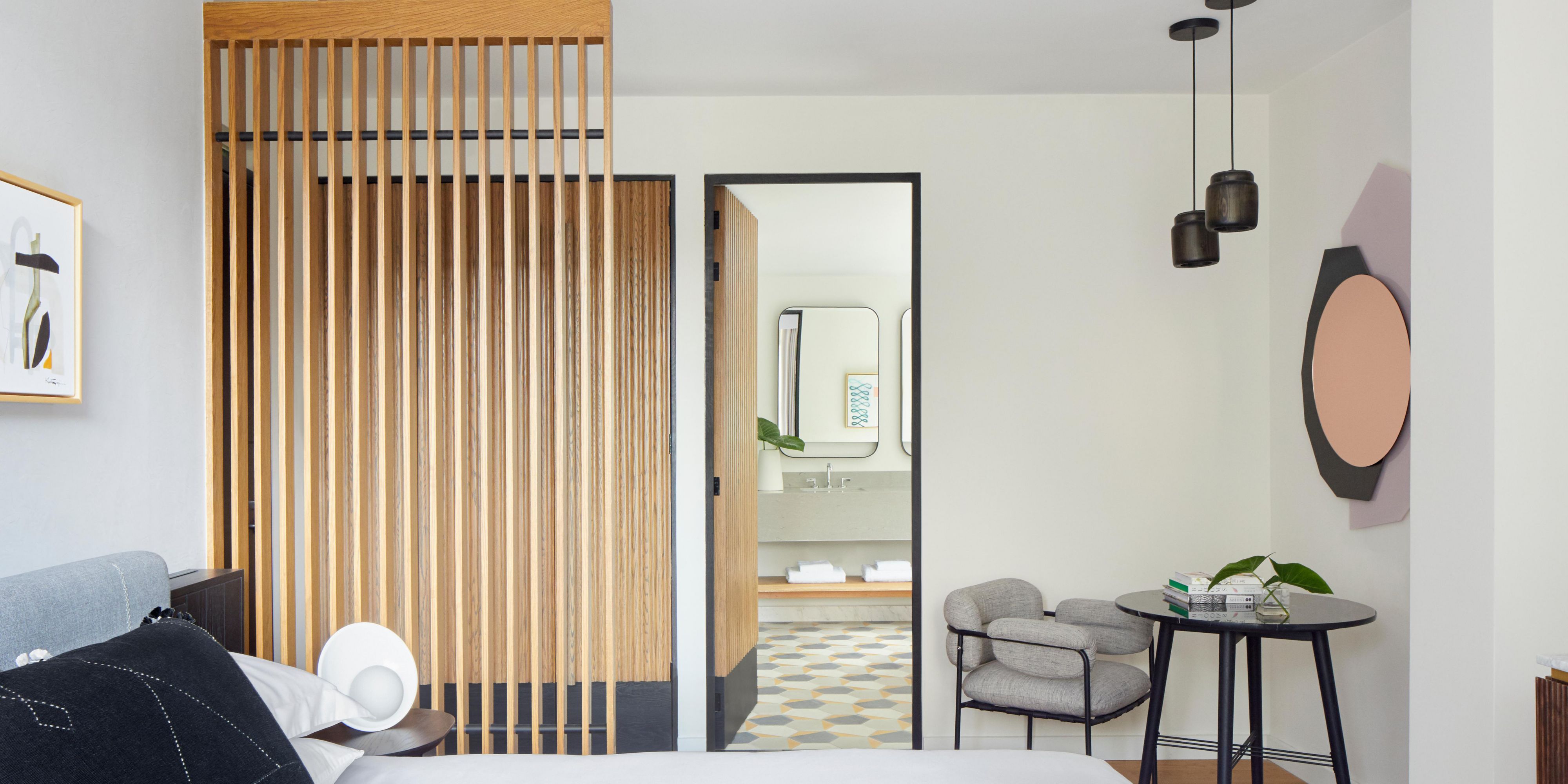 Guest room bathroom entrance at Kimpton El Castelar Polanco