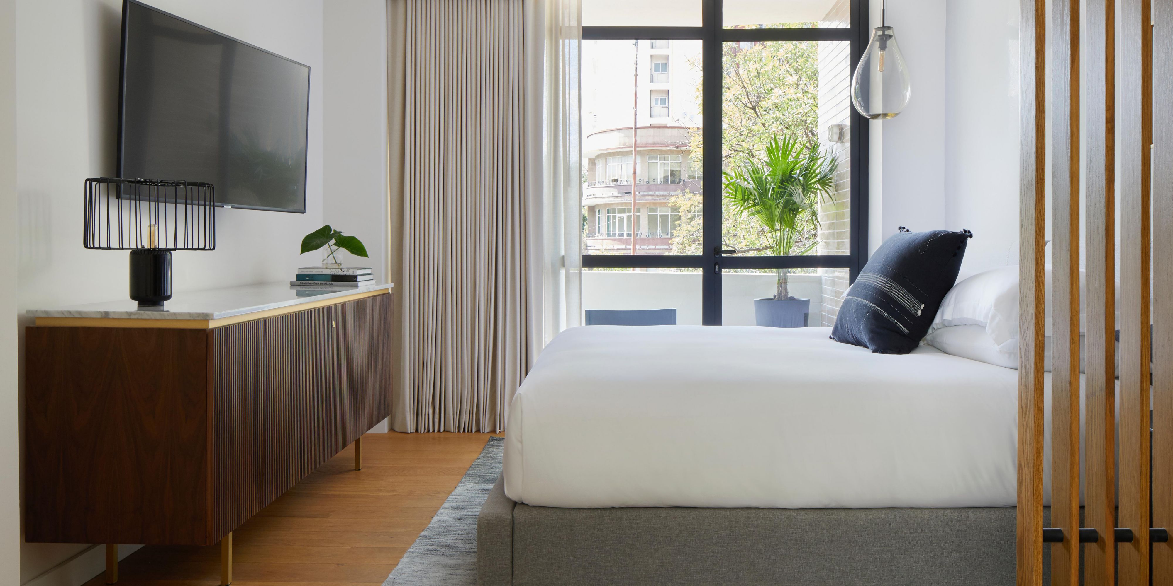 Serene and luxurious guestroom at Kimpton Ashbel New York Park Avenue