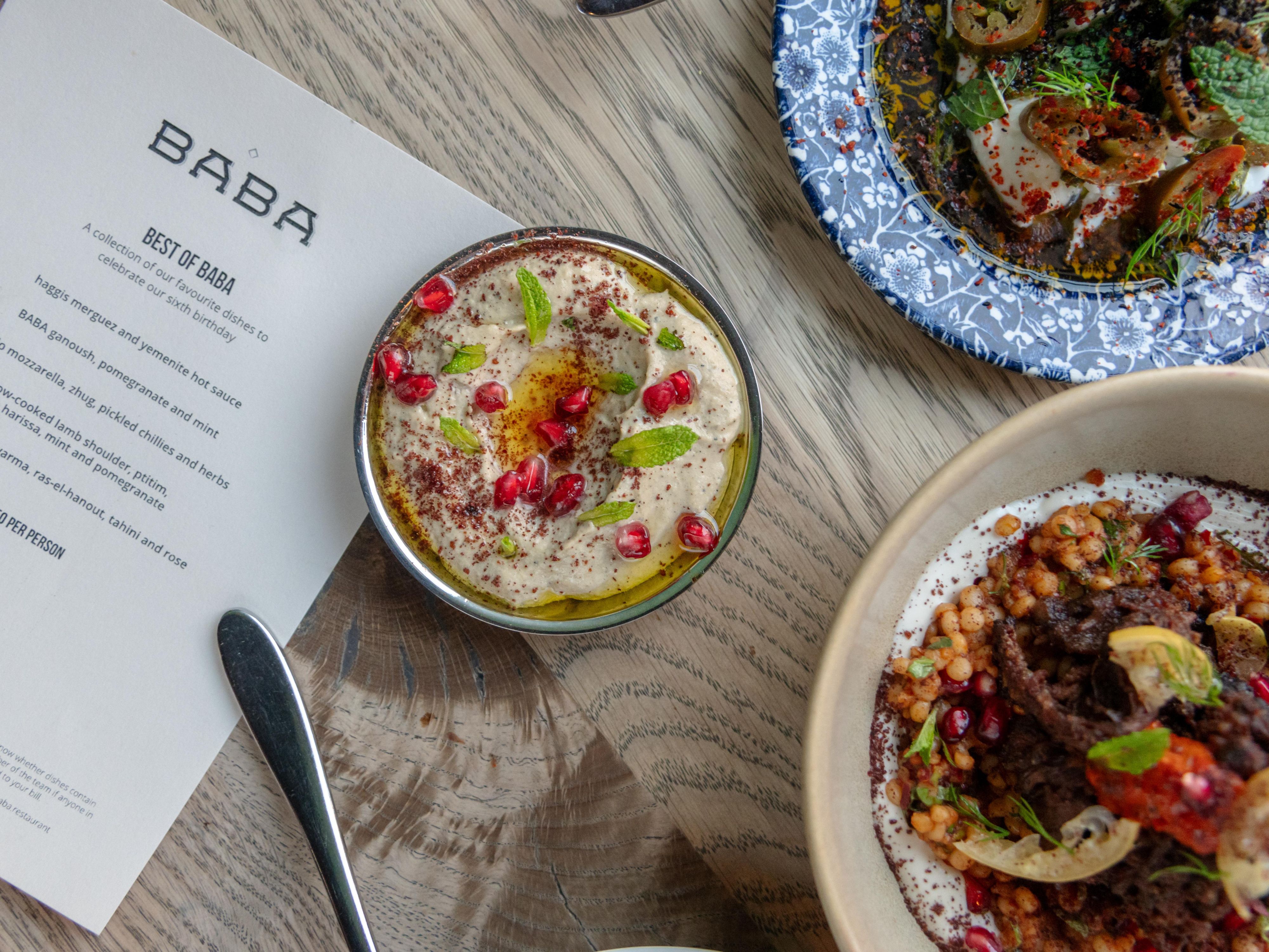 Menu for Baba with a bowl of hummus