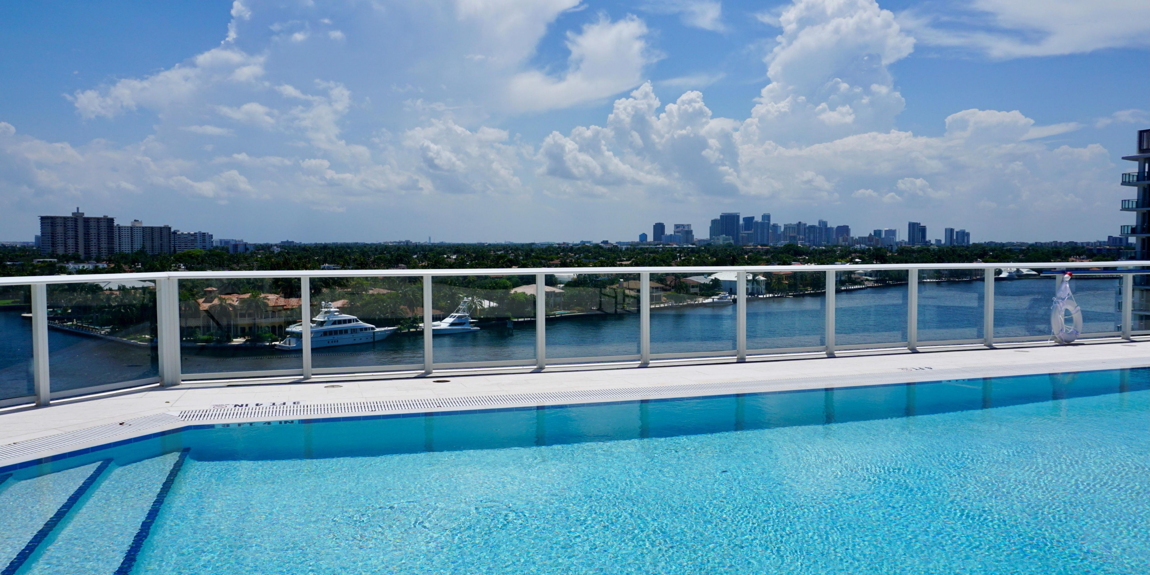 The rooftop pool holds sweeping panoramic views of the intercoastal, as well as loungers and tables to indulge in refreshing specialty cocktails.
