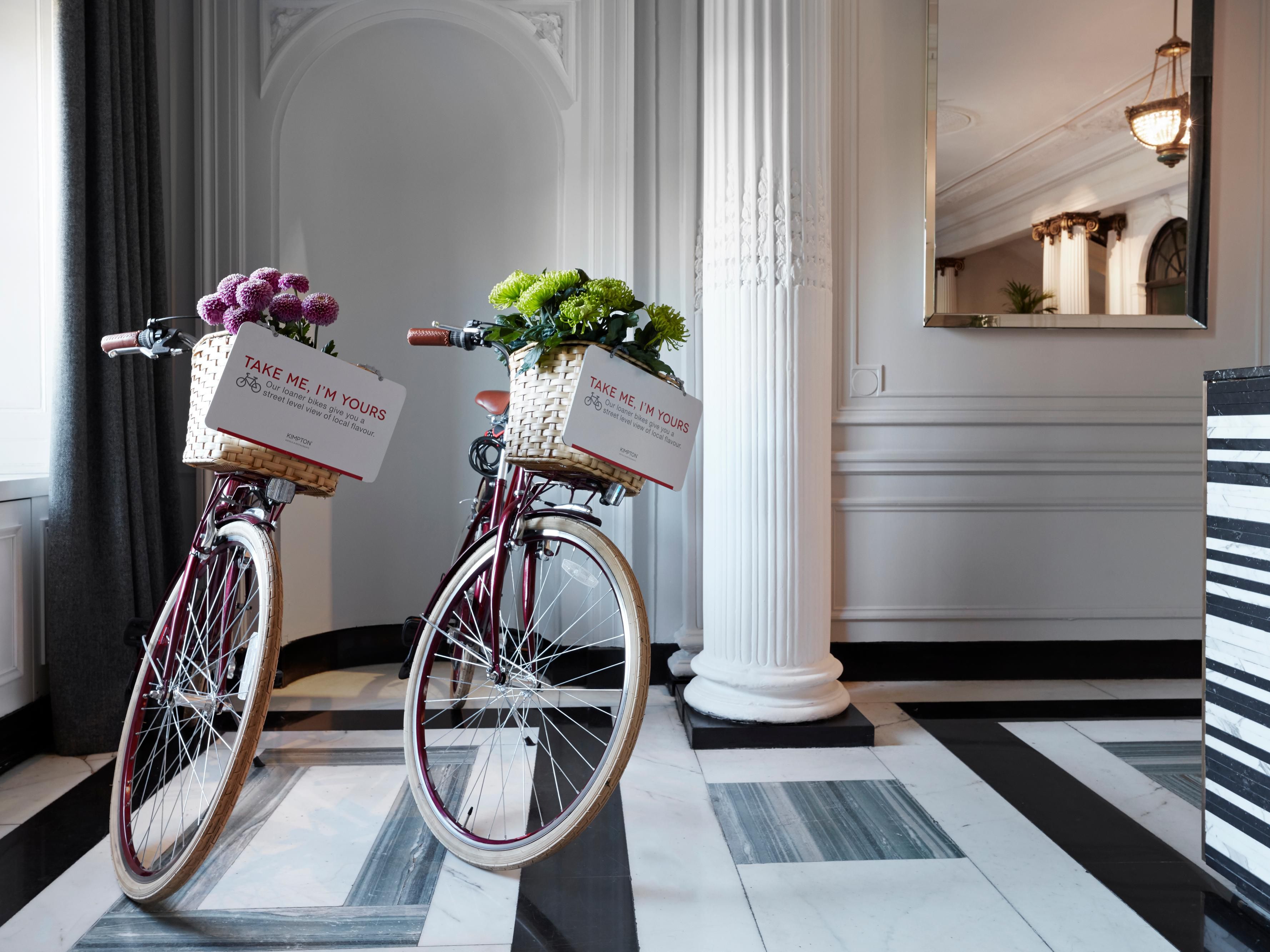 Two bikes in a lobby