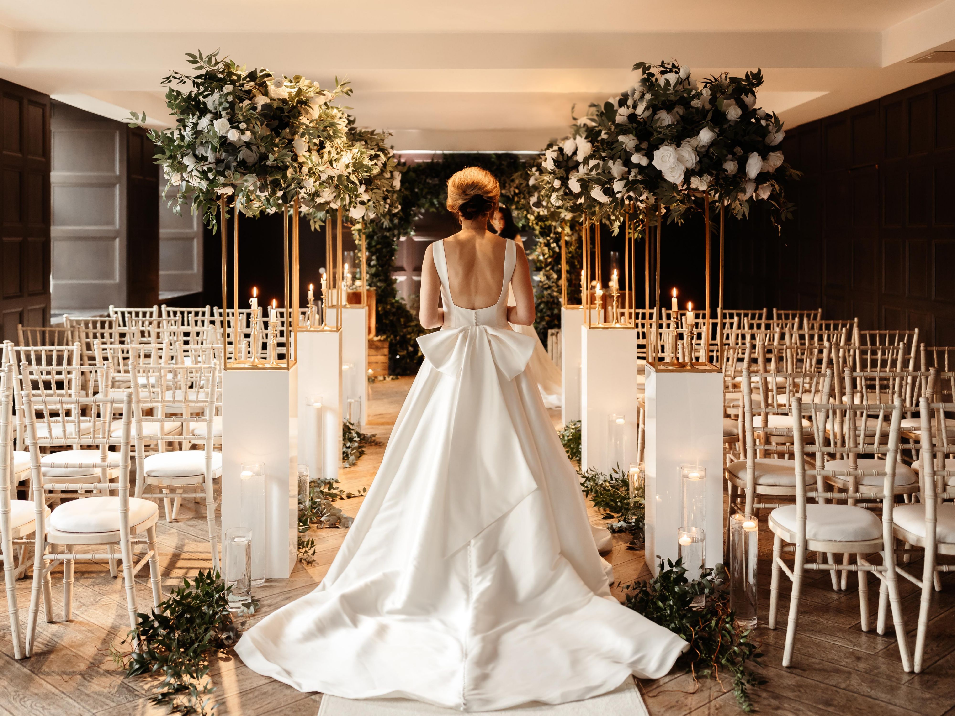 Bride walking down the wedding aisle