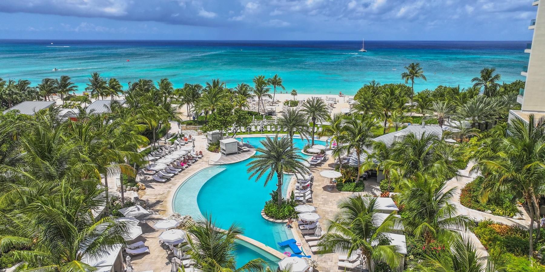 Kimpton Seafire Resort + Spa surprises and delights adults and kids alike. A location on the shore of Seven Mile Beach, our Camp Seafire Kid Zone, and roomy suites practically guarantee the whole family will have a fun-filled vacation they’ll remember forever.