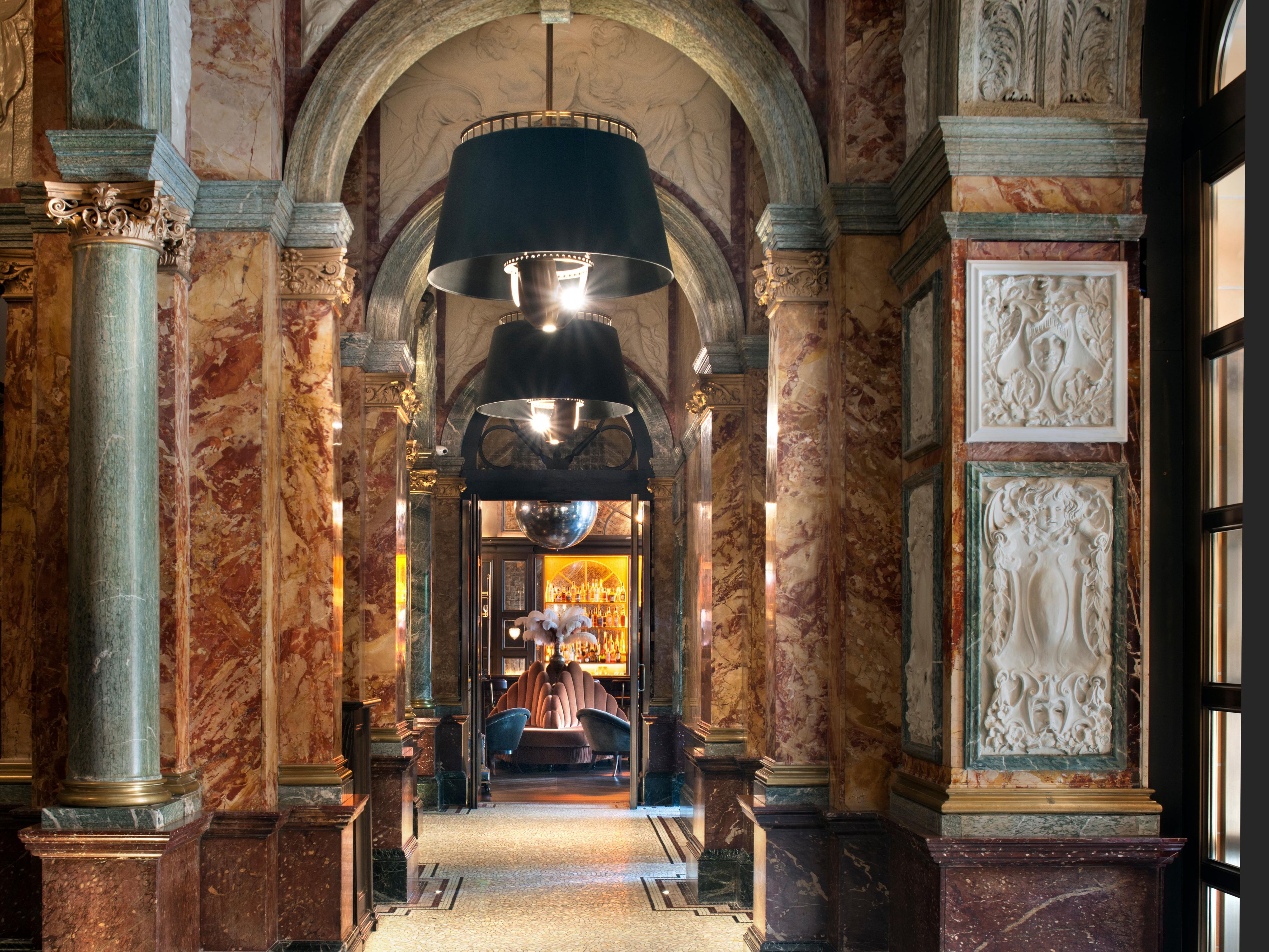 In-Room breakfast plate with eggs benedict and fruit