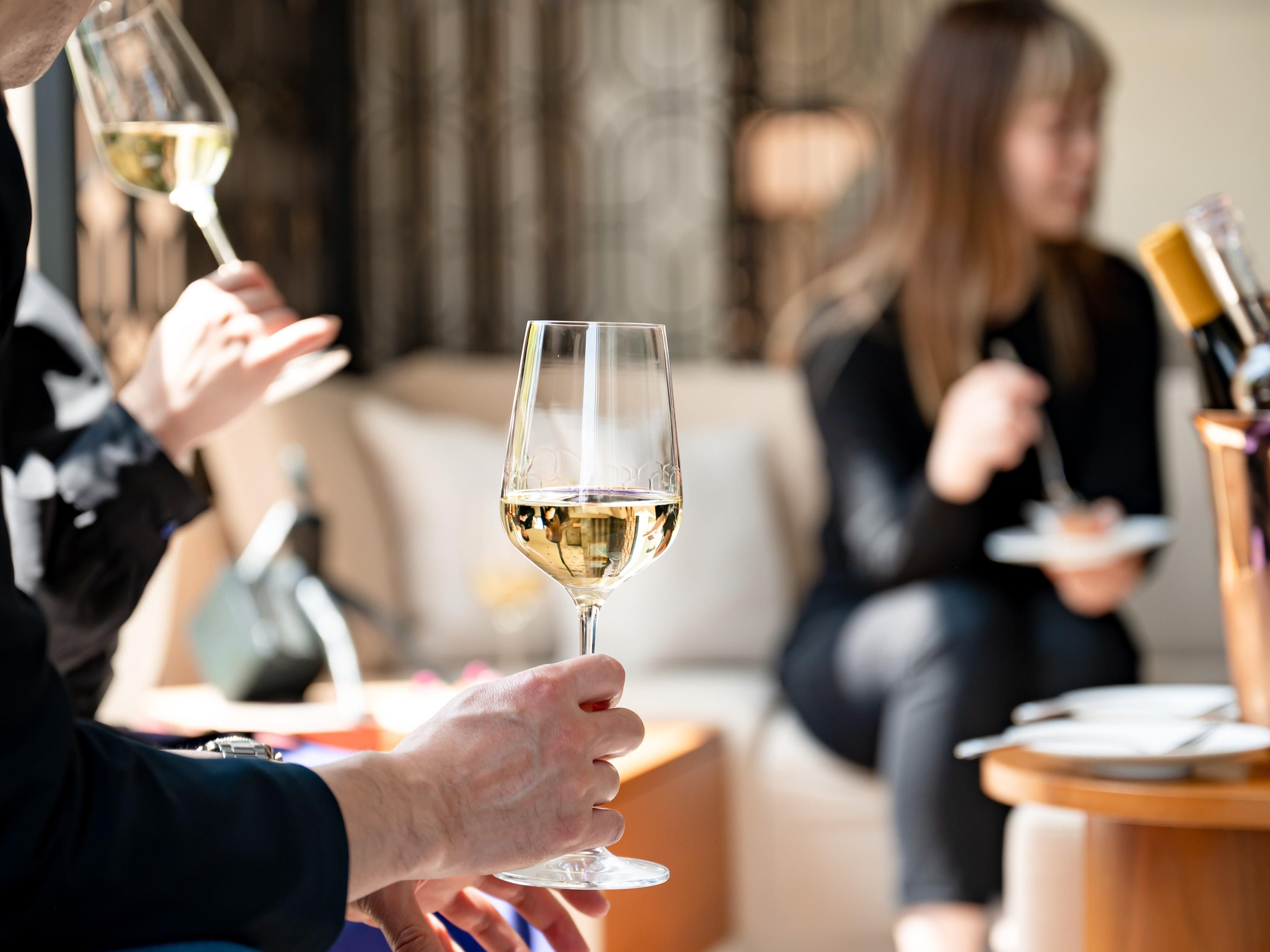 Wine glasses sitting on a bar