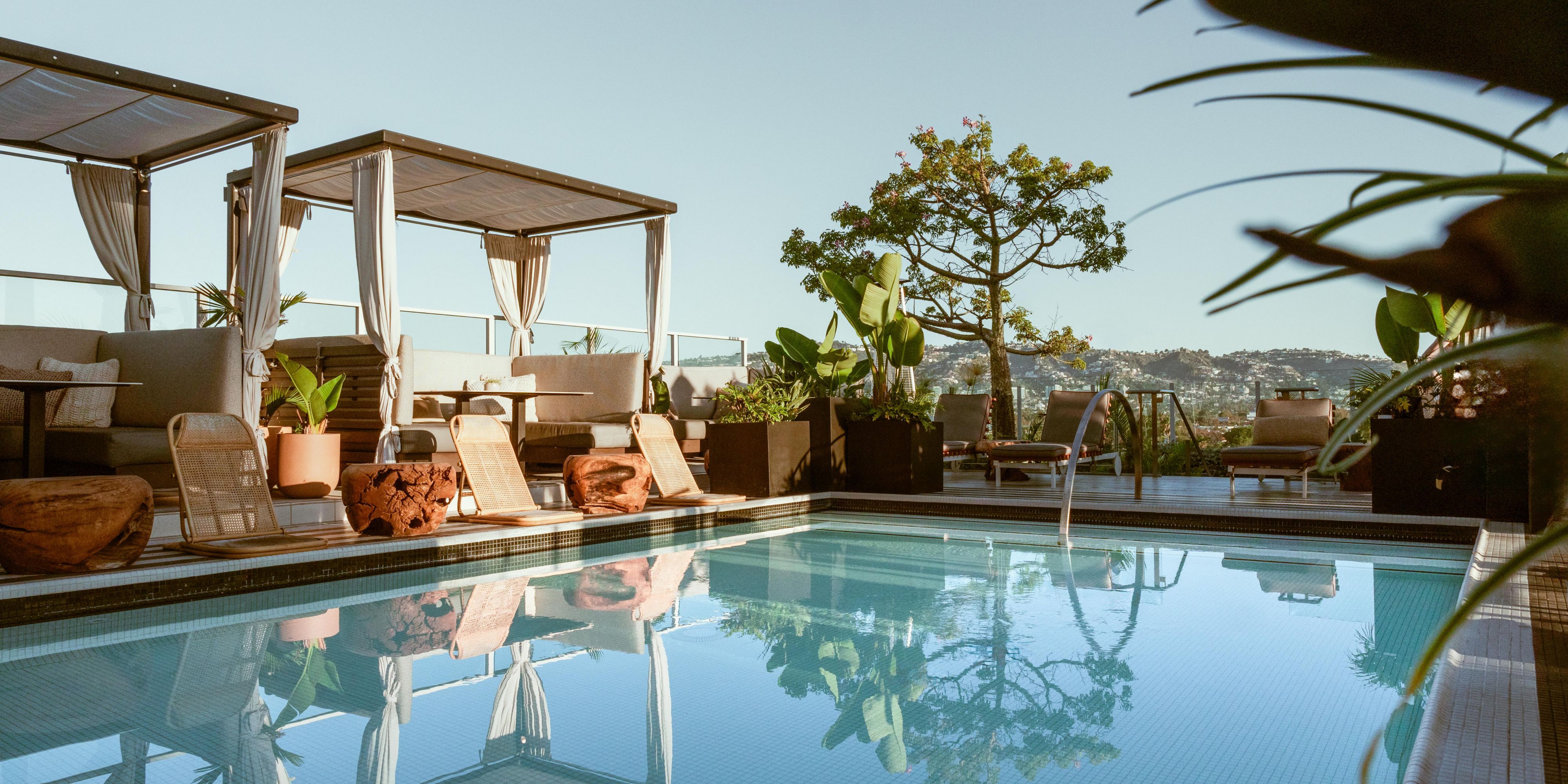 Our rooftop pool boasts a sleek and modern design, with chic lounge chairs and cabanas scattered around the deck, creating the perfect setting for soaking up the California sunshine in style. The ambiance at our rooftop pool is unmatched, providing a serene escape from the hustle and bustle of the city below.