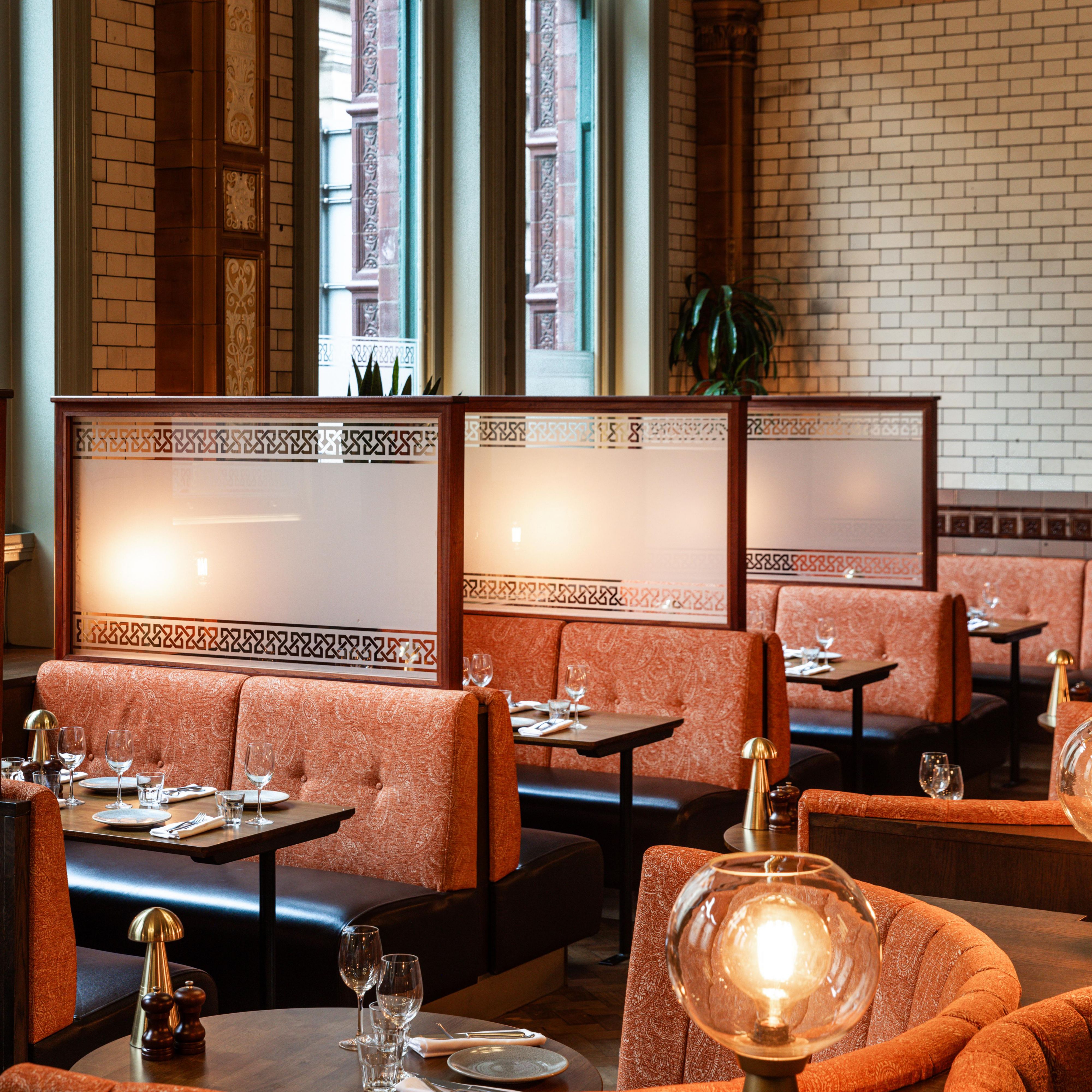 Comfy booths at The Refuge bar & restaurant