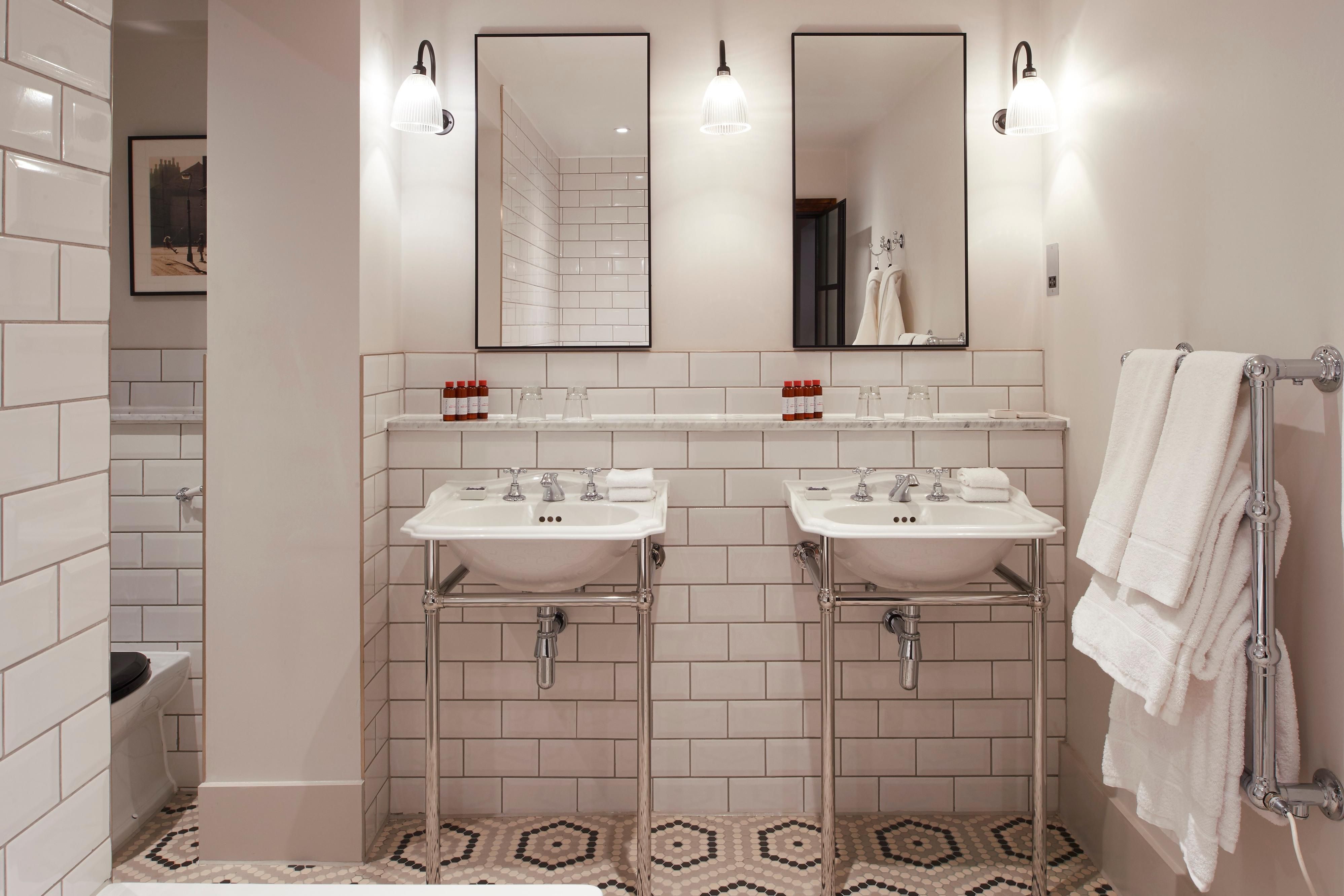 Double sinks in a luxury hotel suite bathroom