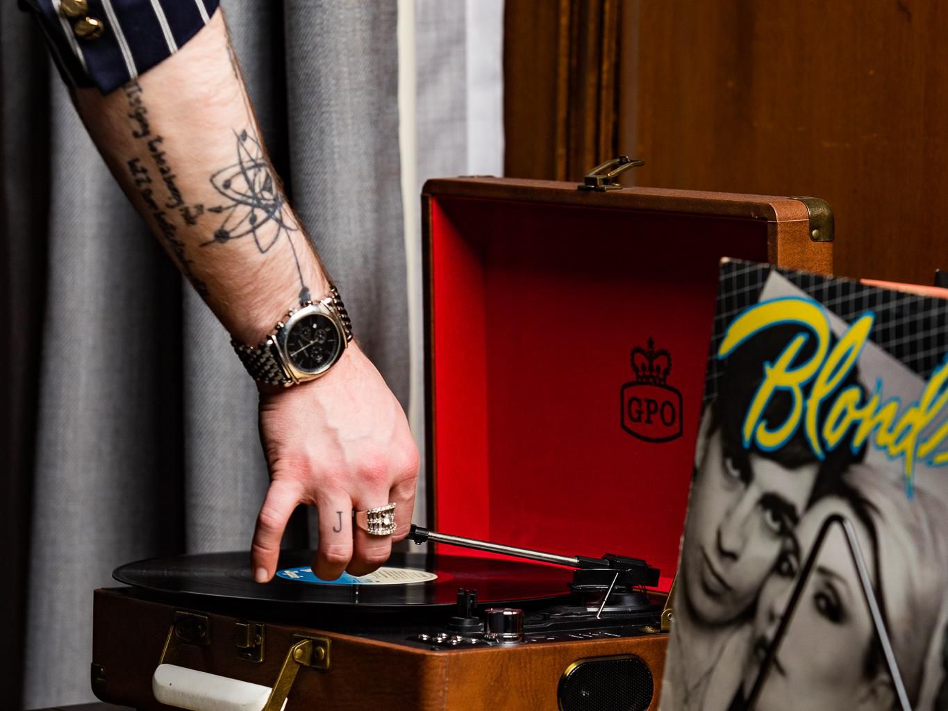 Guest setting up record player