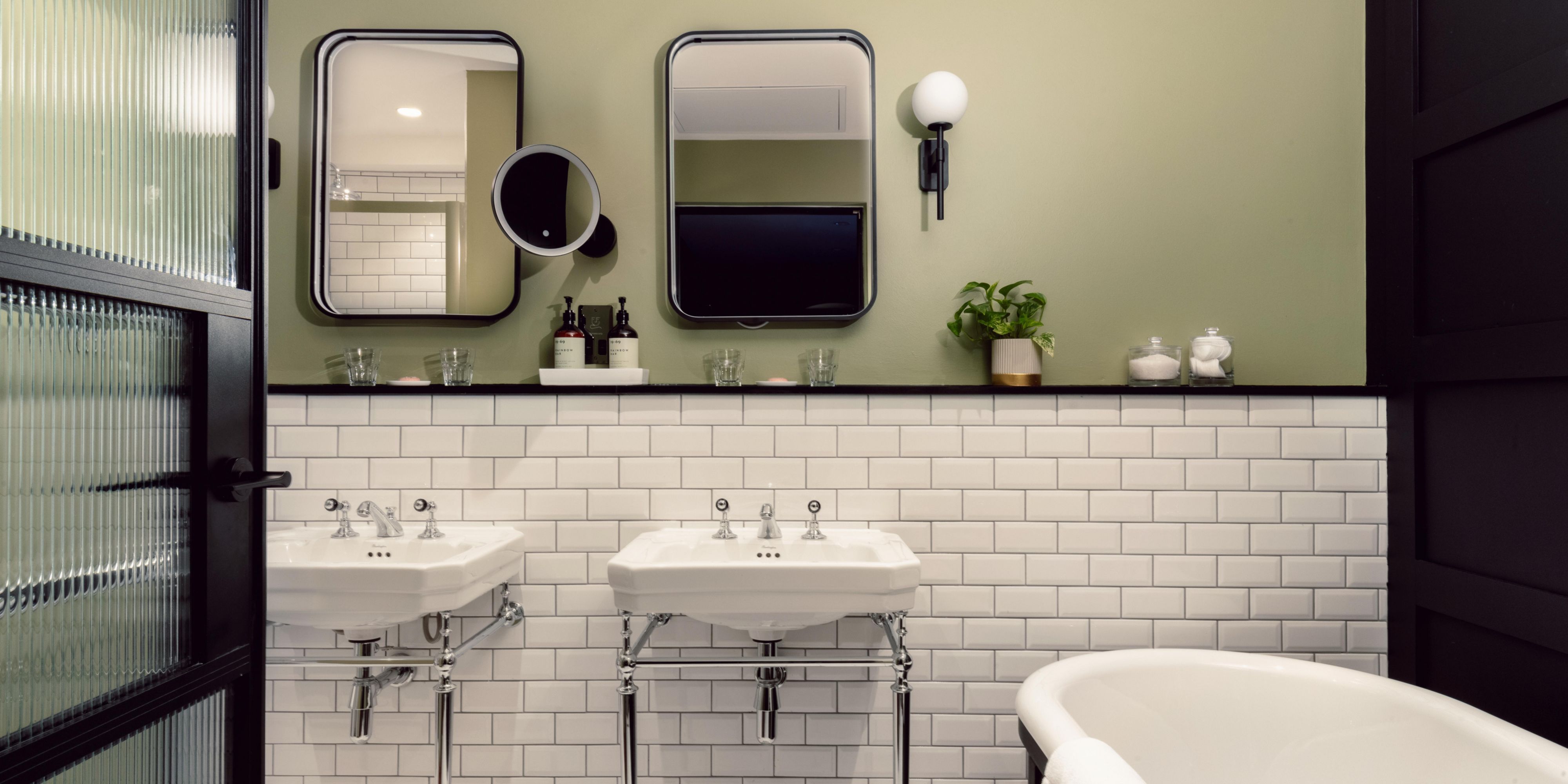 Luxury en-suite bathroom with two sinks