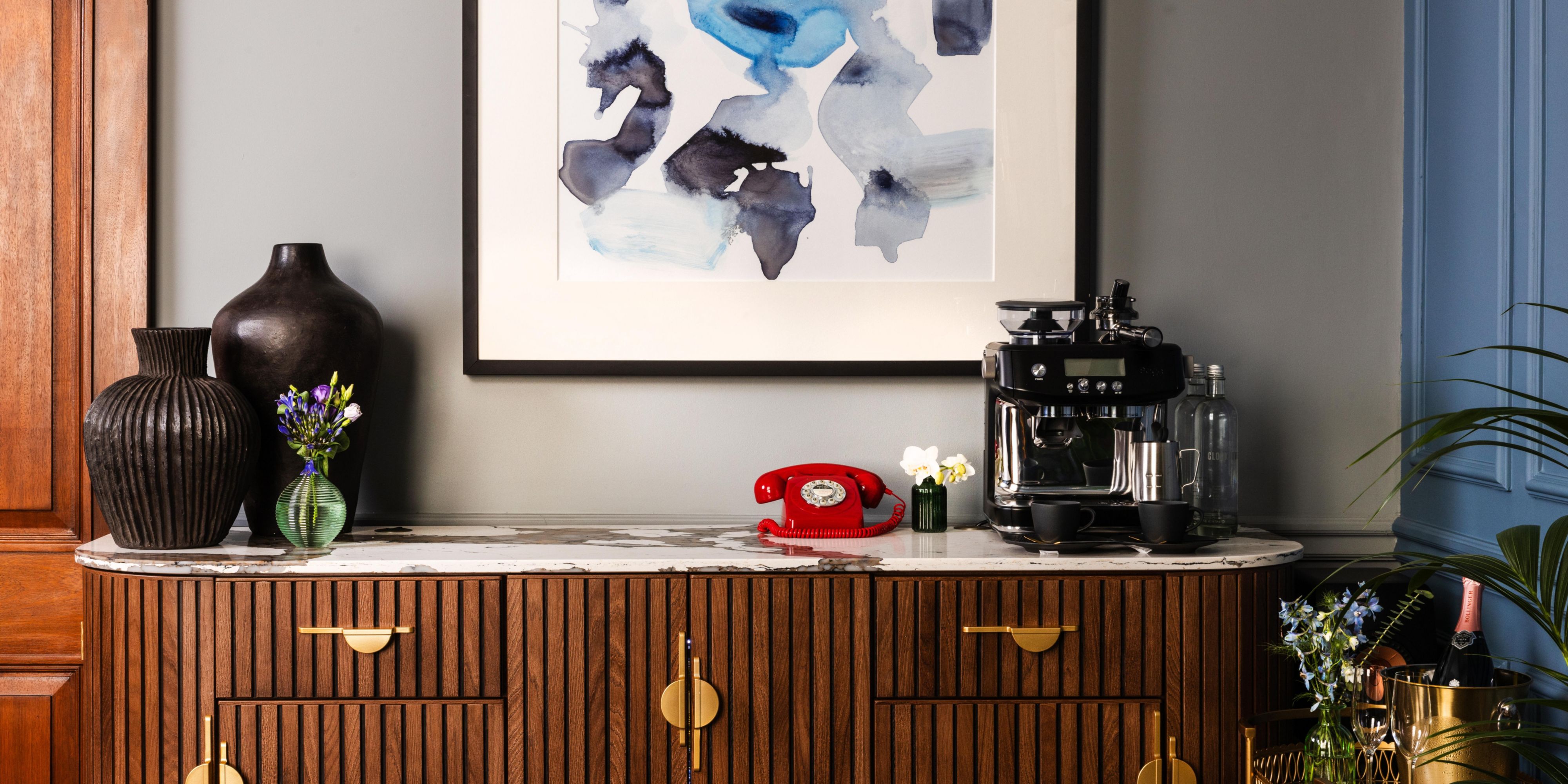 Dresser table with premium coffee machine and British old-school telephone
