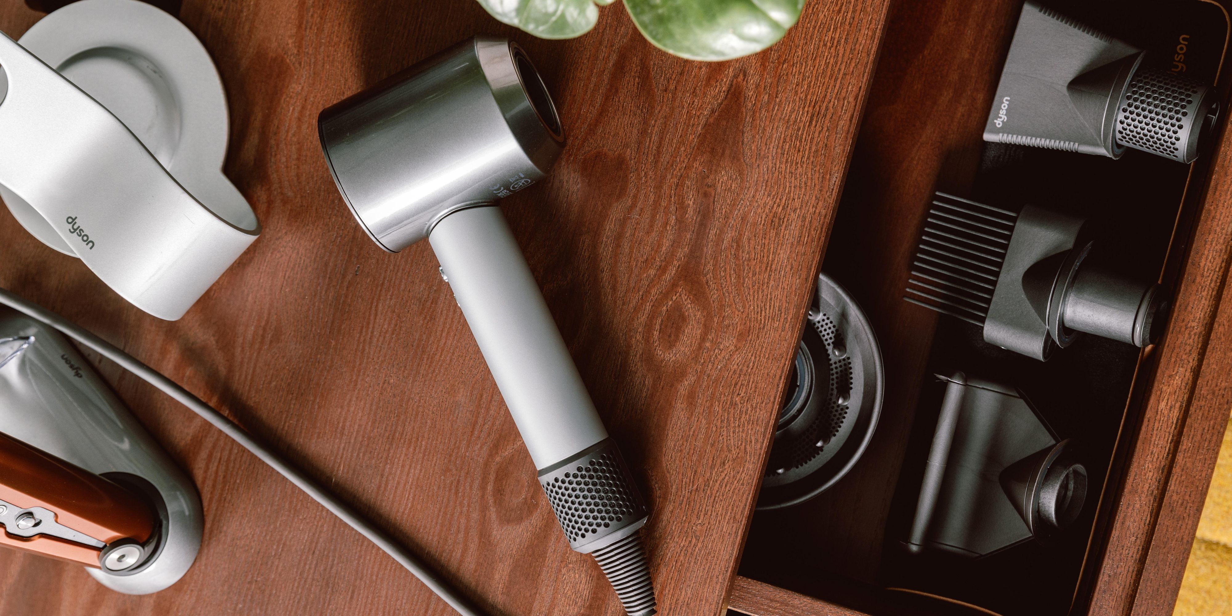 Dyson hair styling tools and various styling attachments 