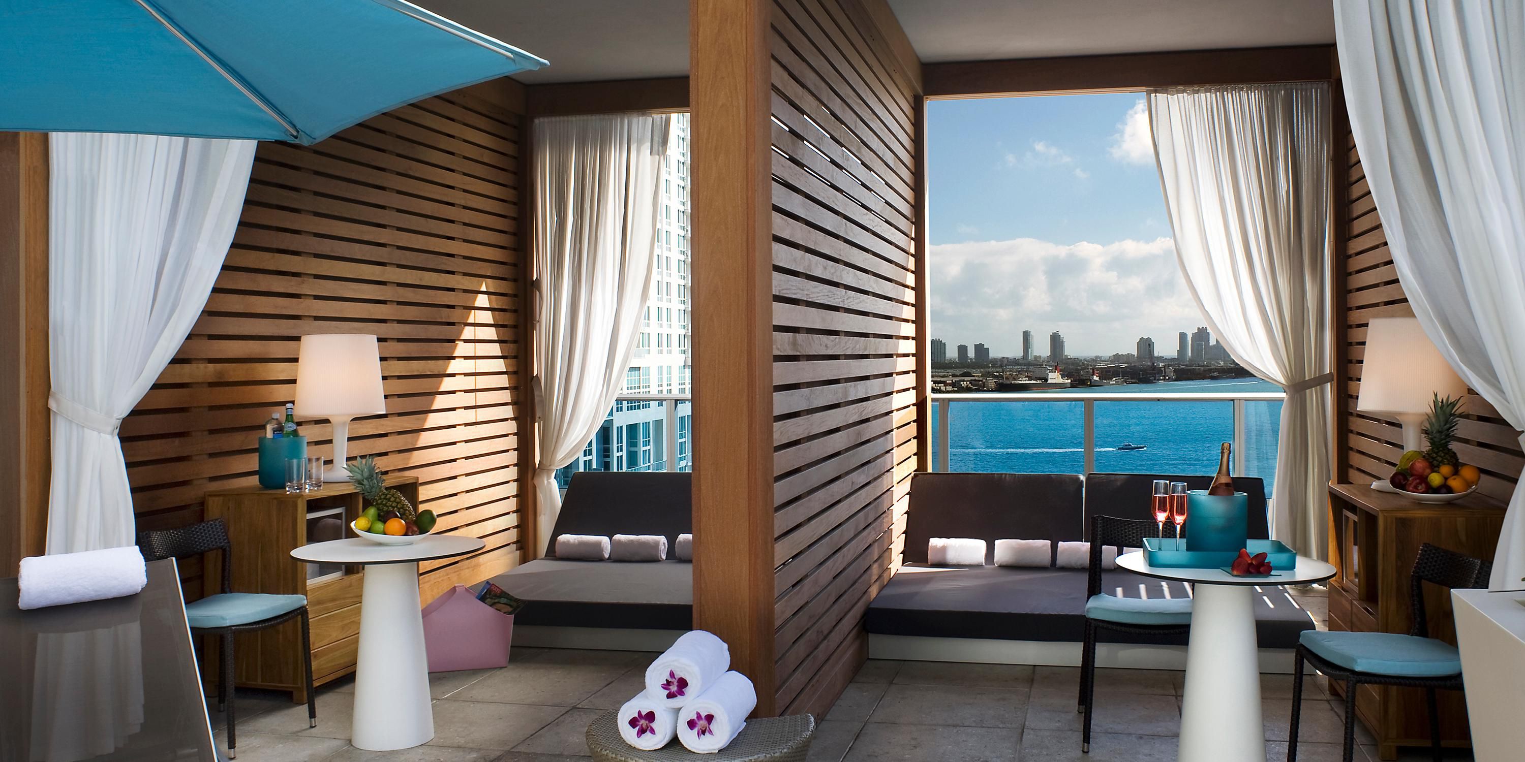 A location among the skyscrapers, two shimmering pools, chic daybeds for lounging, creative cocktails, and private cabanas make Kimpton EPIC's pool area the place to be on the waterfront in downtown Miami. It's always beautiful up here, but sunrise and sunset are particularly scene-stealing.