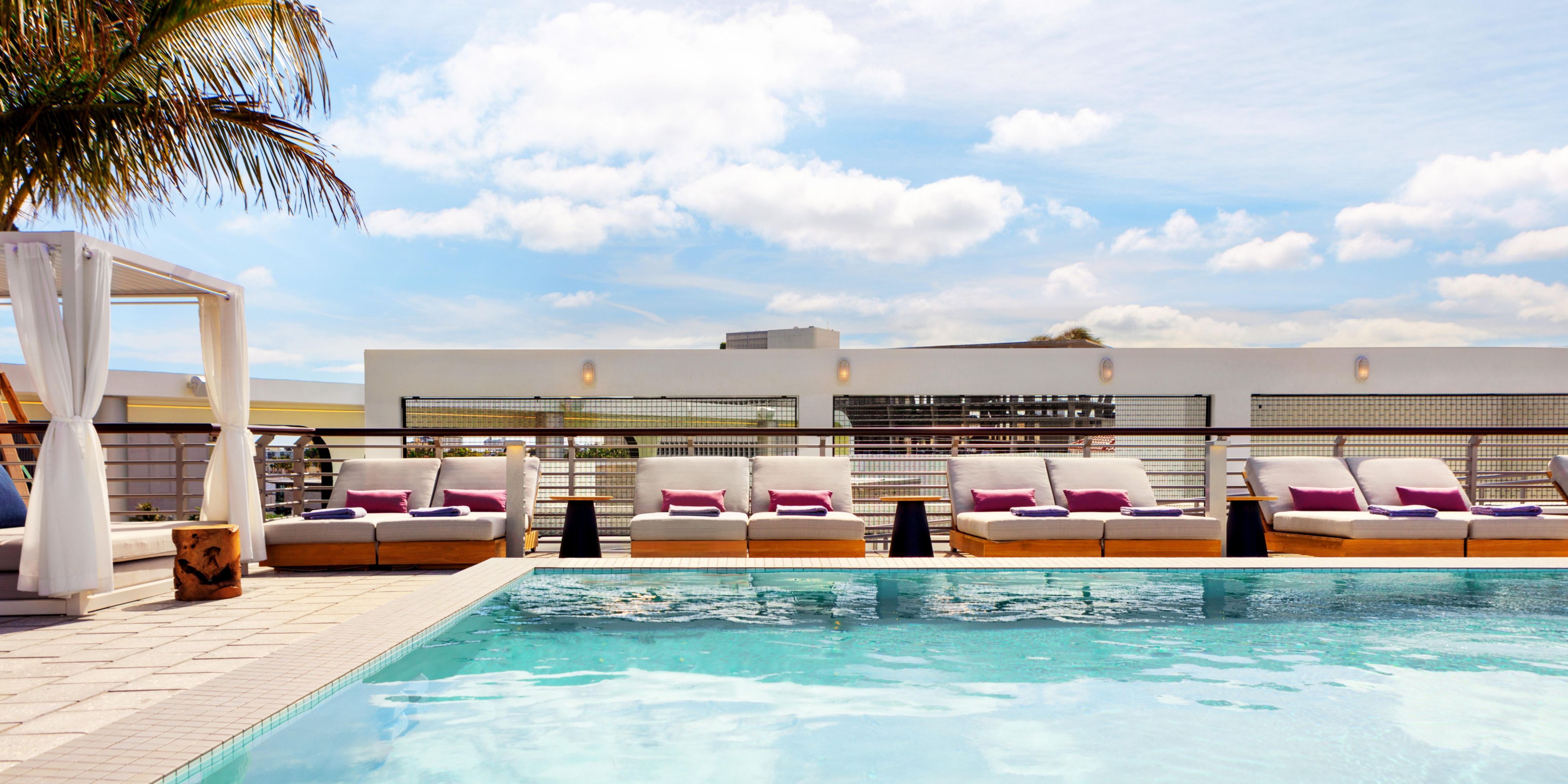 Linger poolside, dipping your toes into the still surface of the water, or settling back in an oversized lounge chair, cocktail in hand. Beyond the pool are multiple tiers, each offering comfortable seating areas for unwinding with friends and taking in the panoramic views of Miami’s skyline and waterways.