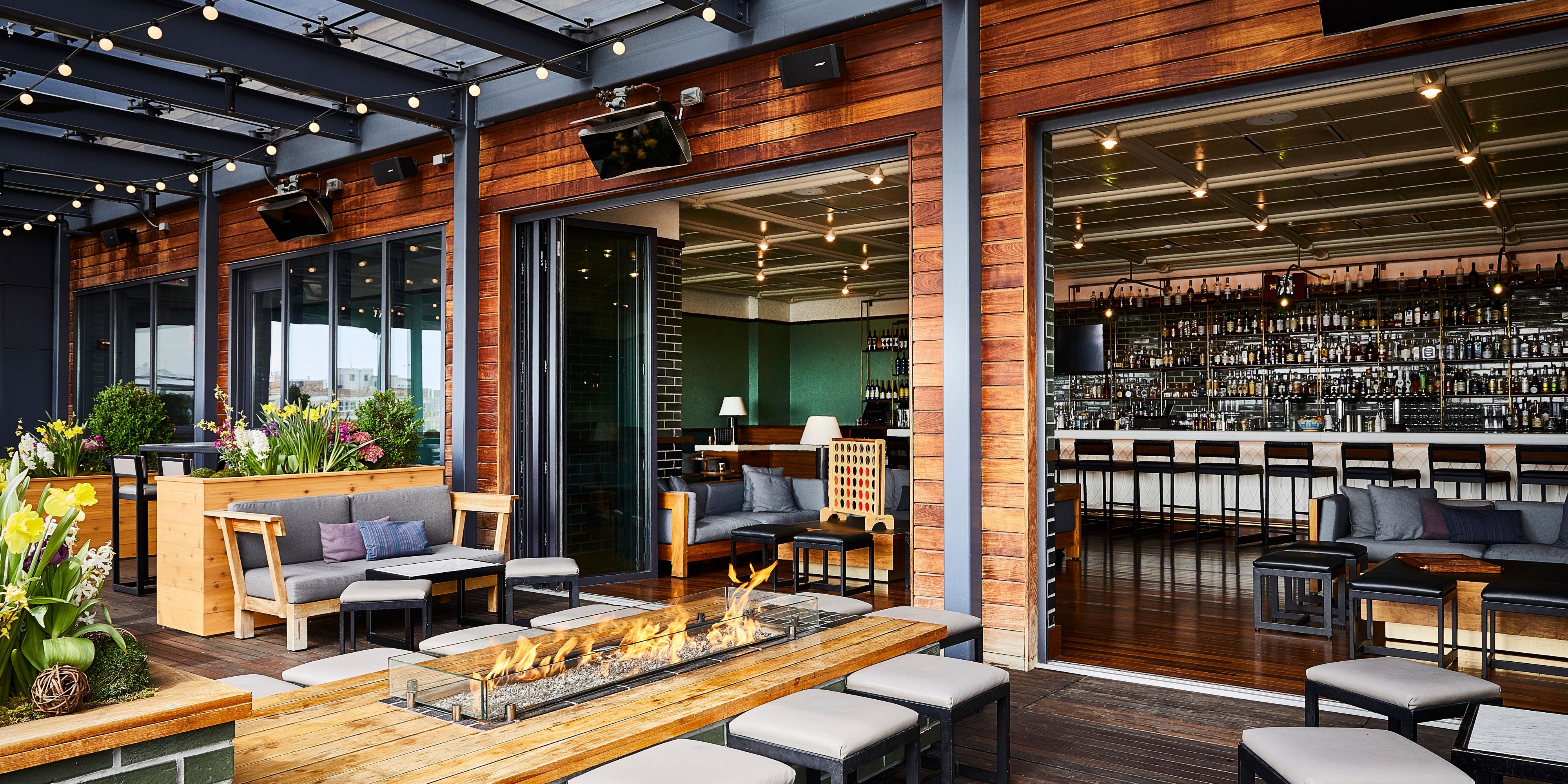 Beer swillers, board game aficionados, and BBQ lovers unite — indoor/outdoor rooftop restaurant and bar The Outsider has something for you. And, something for anyone who wants to have a good time in a one-of-a-kind venue. With sunset views, fire pits, shuffleboard tournaments, and low-key brunches, this is the place to be in downtown Milwaukee.