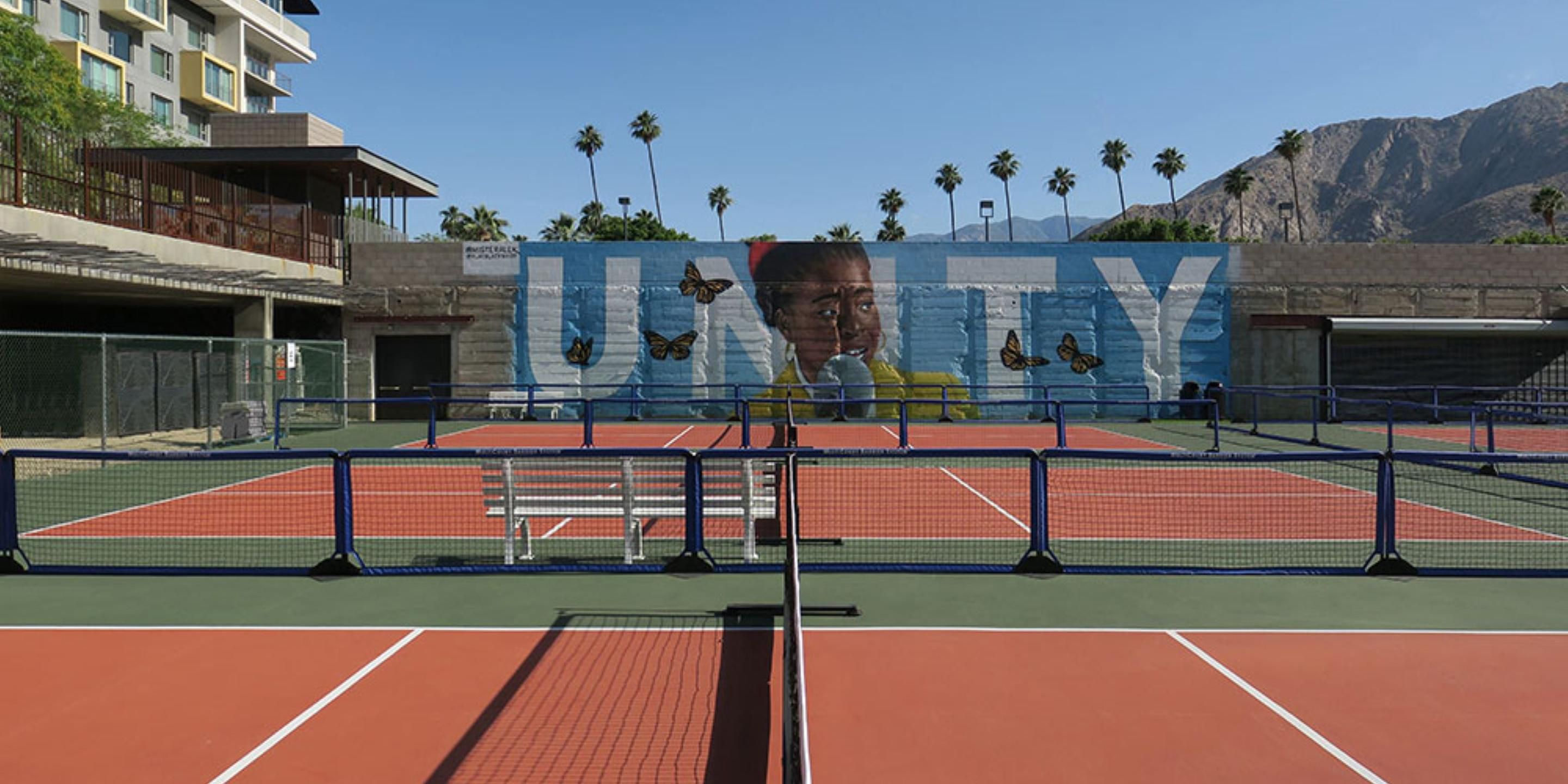 This unique outdoor venue boasts six expansive pickleball courts (over 11,000 square feet) and an unforgettable atmosphere adjacent to our downtown hotel, available exclusively for hotel guests to enjoy.