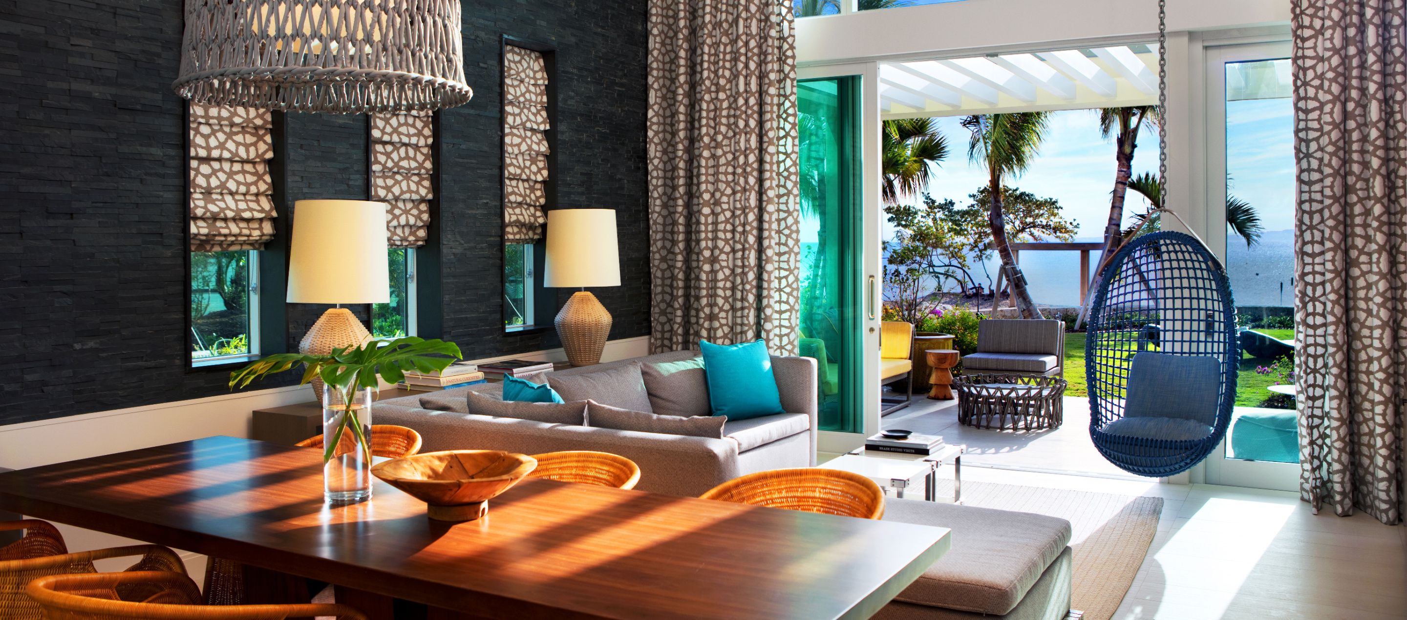 bungalow in grand cayman with colourful decor and stuning views of the ocean