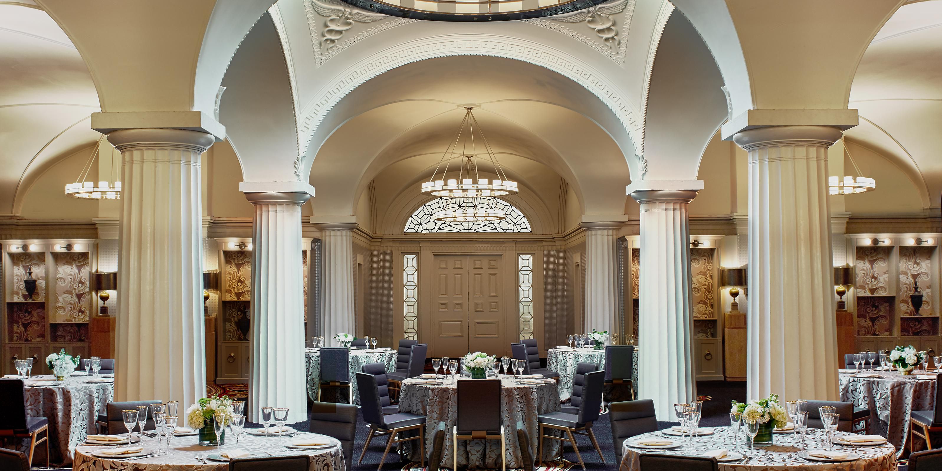 Our hotel hosts delightfully unique weddings, thanks to top-notch service and our historic-meets-contemporary venue that showcases stunning features like soaring ceilings, dramatically long hallways, period architectural details, plus marble staircases and a recently-refreshed ballroom with 20-foot ceilings and a grand dome.