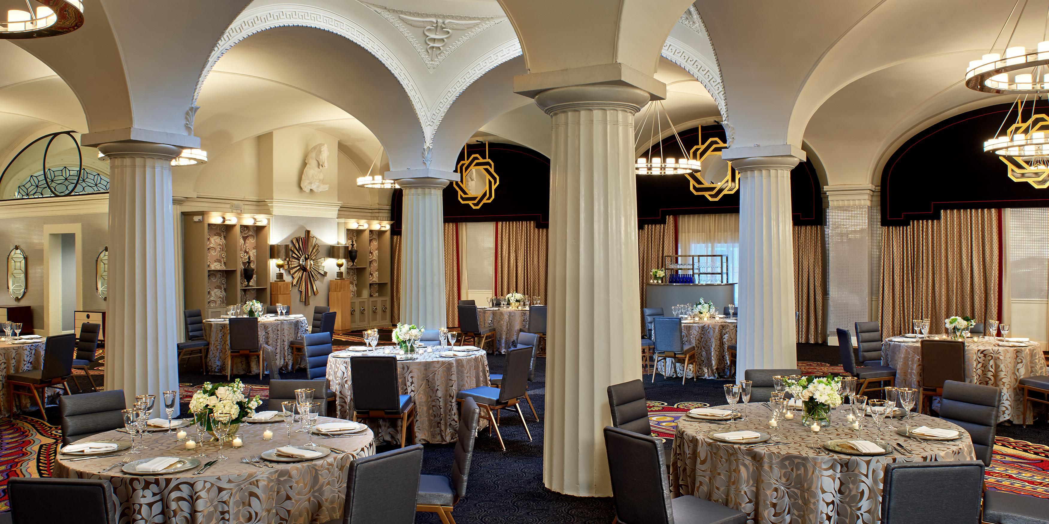 Our ballroom got a recent facelift, and the results are stunning. Elegant tochiere floor lamps, ornate mirrors, and classical sconces coexist against bold, vibrant patterns and dazzling chandeliers that energize the grand space that can accommodate 120 to 200 guests. Relish features like 20-foot ceilings plus a grand dome and skylight.