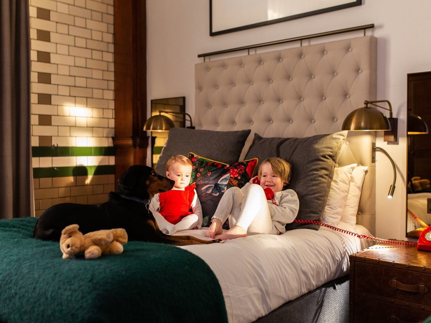 Couple of children resting in a hotel guest room