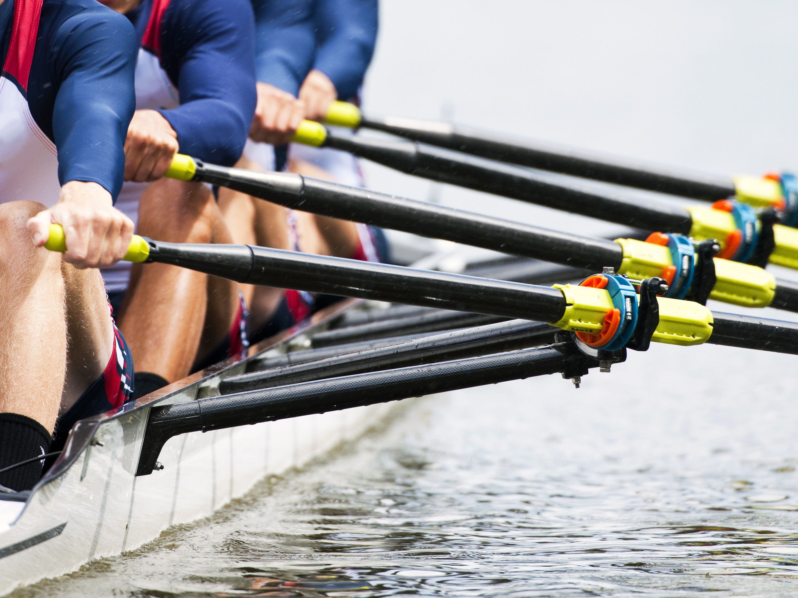 Men's row team on the water