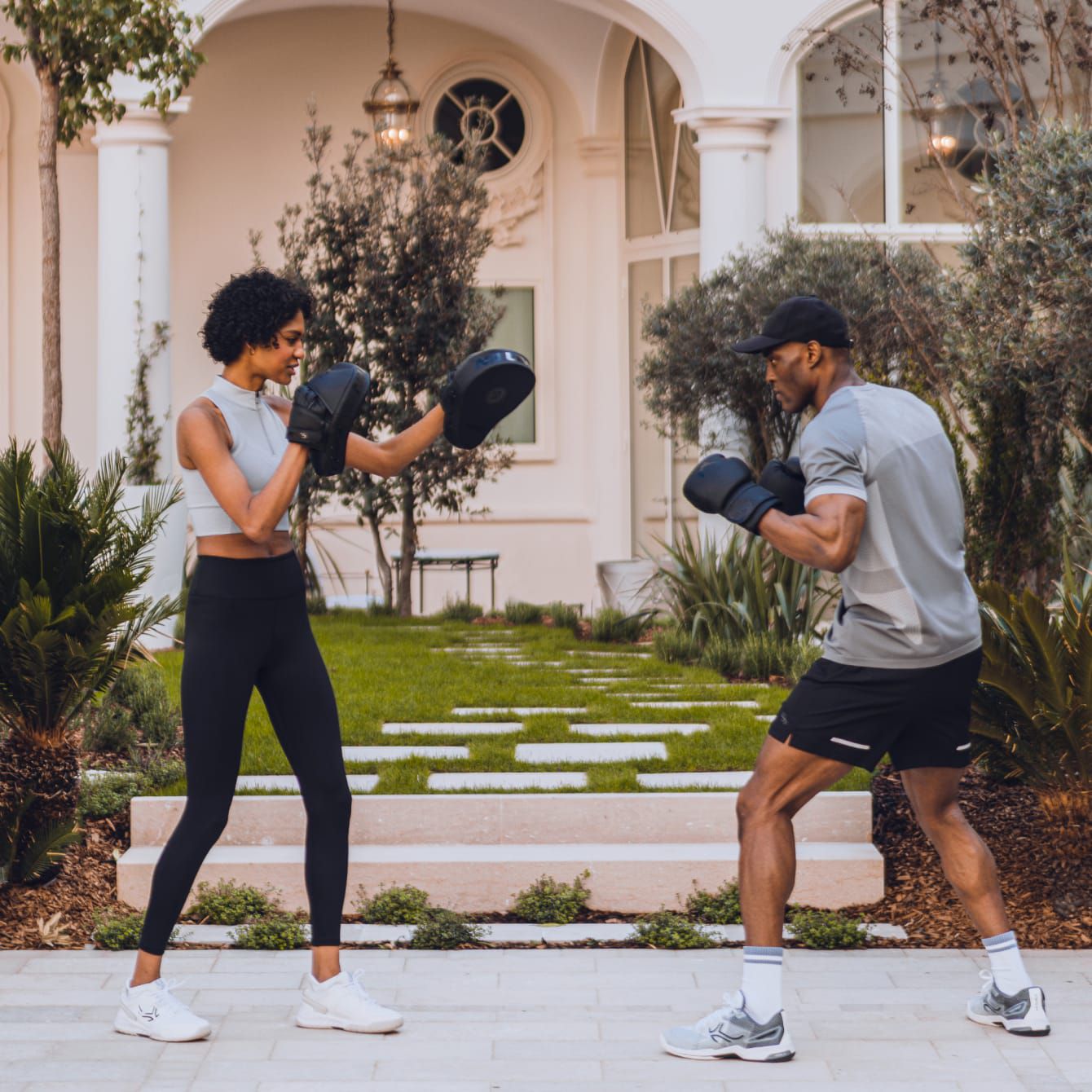 A guest enjoys private outdoor boxing practice.