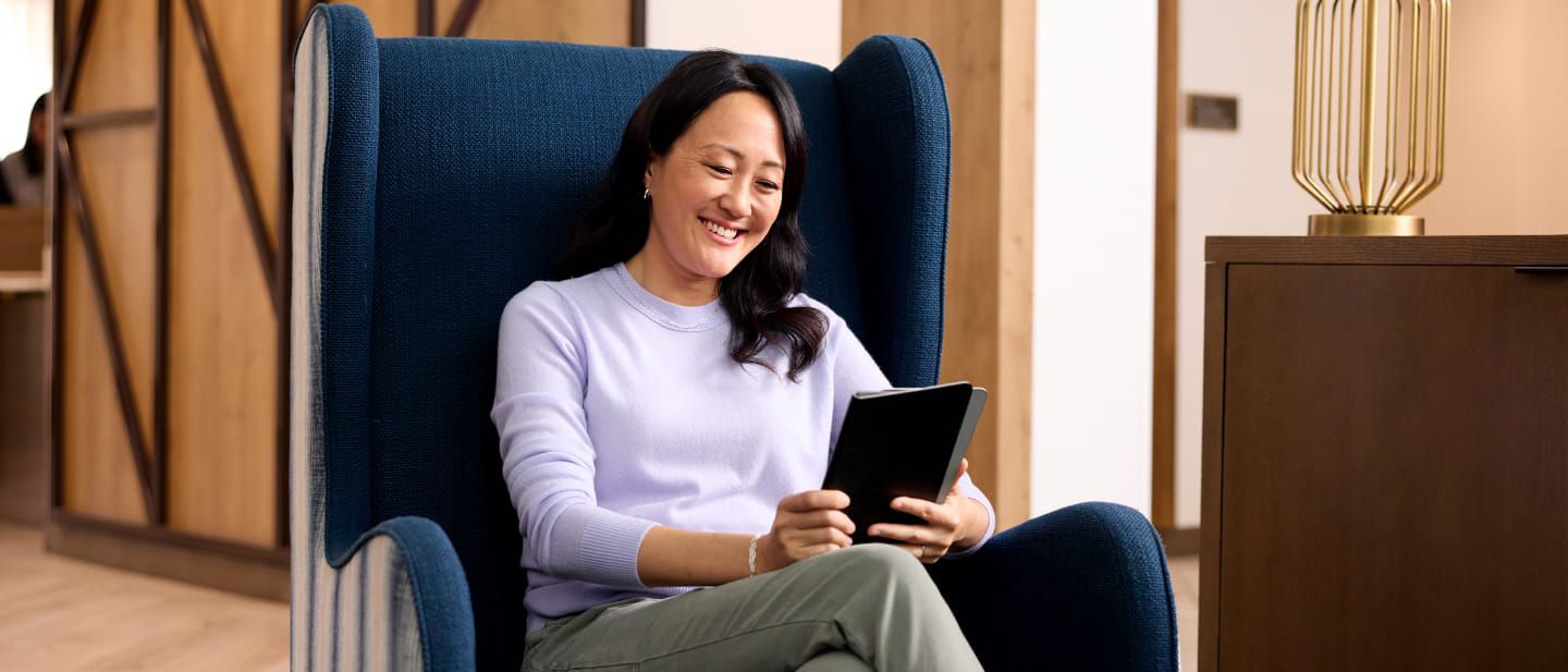 Hotel guest sitting in lobby