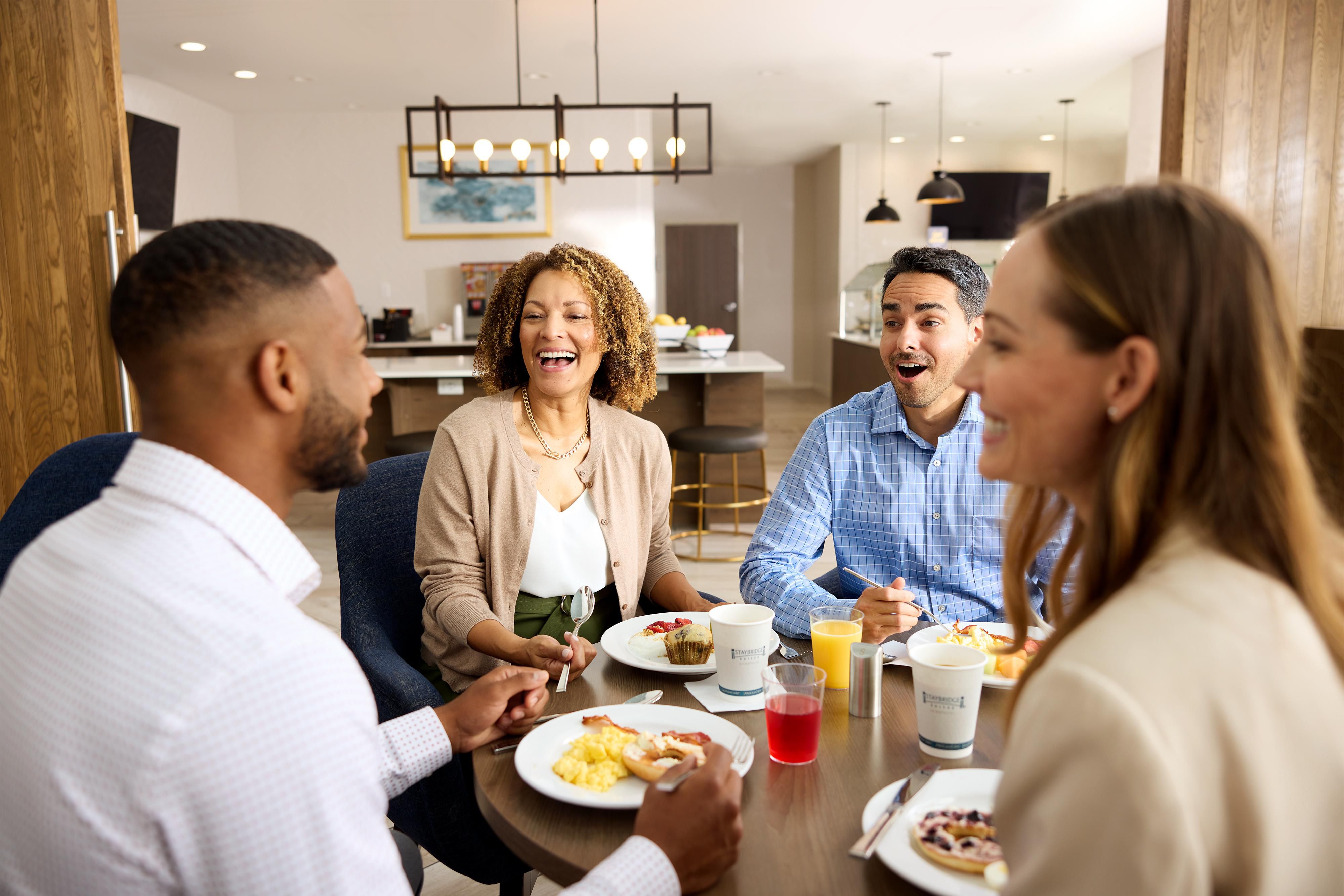 Kickstart your morning with our free hot breakfast buffet, offering various delicious options, including eggs, fresh fruit, and waffles. Wind down at our evening socials, hosted Monday through Wednesday, where guests can enjoy complimentary food, beer, wine, and non-alcoholic beverages—perfect for relaxing after a busy day.