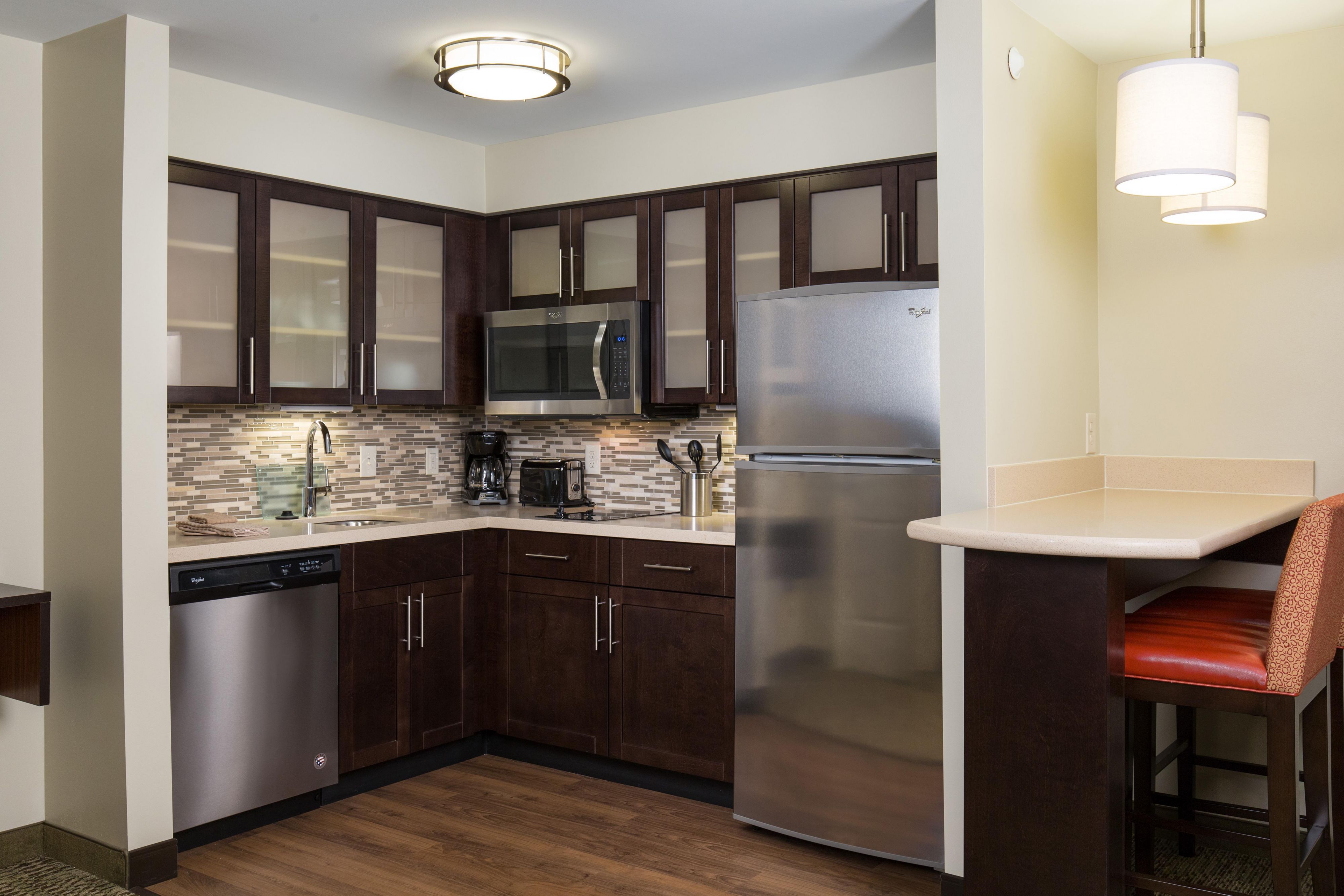 Flexibility to cook what you want, when you want with a cooktop stove, microwave, full refrigerator, garbage disposal, coffee maker, toaster and complete with linens and utensils. 