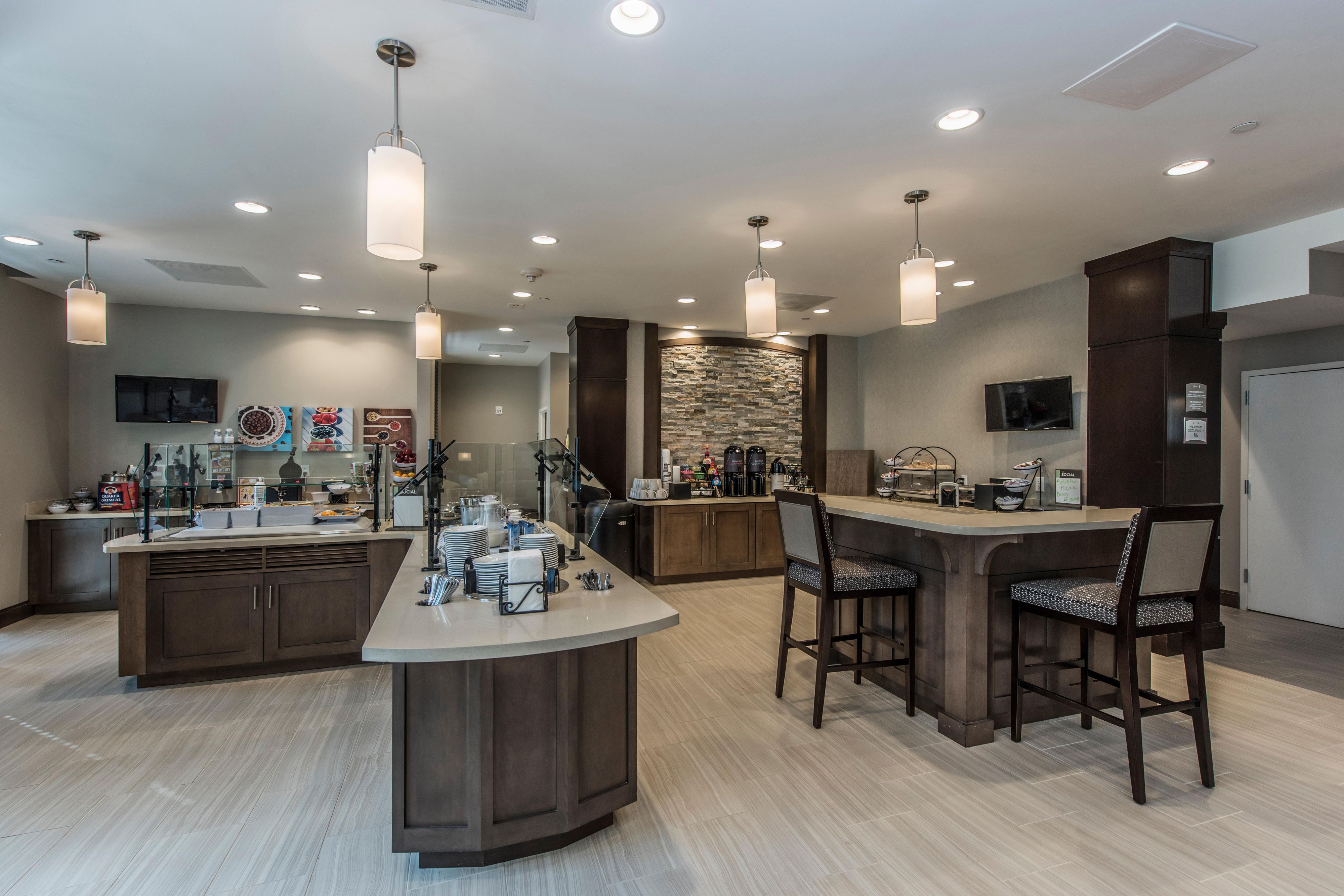 Start your day with our complimentary breakfast buffet, featuring hot and cold options, freshly prepared every day. Enjoy hearty and healthy selections and a wide variety for long-term guests. Breakfast is served Monday to Friday 6:00 AM to 10:00 AM and Saturday and Sunday 7:00 AM to 11:00 AM.