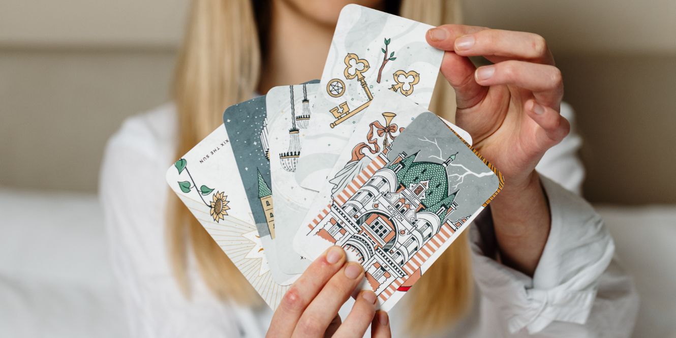 Woman laying in bed with a sleep mask on her face